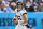 NASHVILLE, TN - JANUARY 07: Jacksonville Jaguars quarterback Trevor Lawrence (16) scrambles out of the pocket during the NFL game between the Tennessee Titans and the Jacksonville Jaguars on January 7, 2024, at Nissan Stadium in Nashville, TN. (Photo by Bryan Lynn/Icon Sportswire via Getty Images)