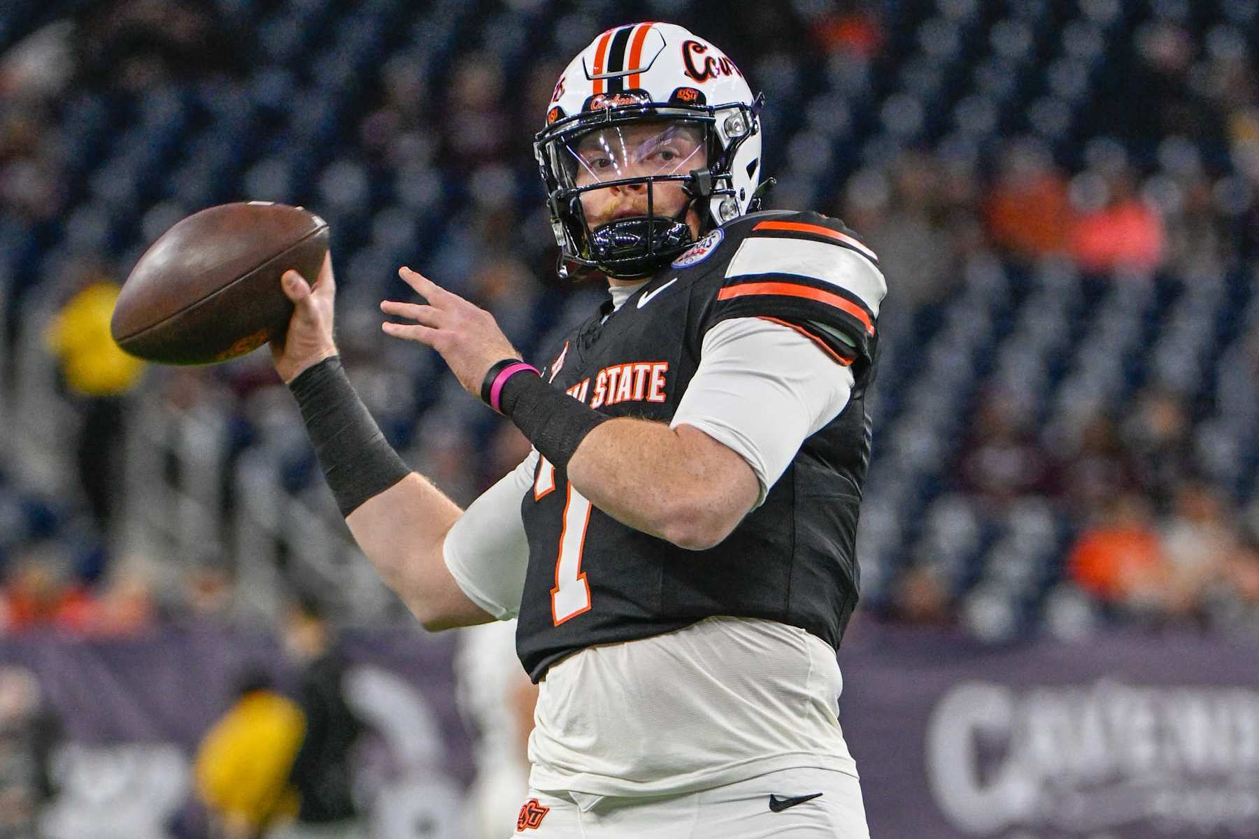 HOUSTON, TX - DECEMBER 27: Oklahoma State Cowboys quarterback Alan Bowman (7) warms up before the TaxAct Texas Bowl between the Texas A&M Aggies and Oklahoma State Cowboys at NRG Stadium on December 27, 2023 in Houston, Texas. (Photo by Ken Murray/Icon Sportswire via Getty Images)