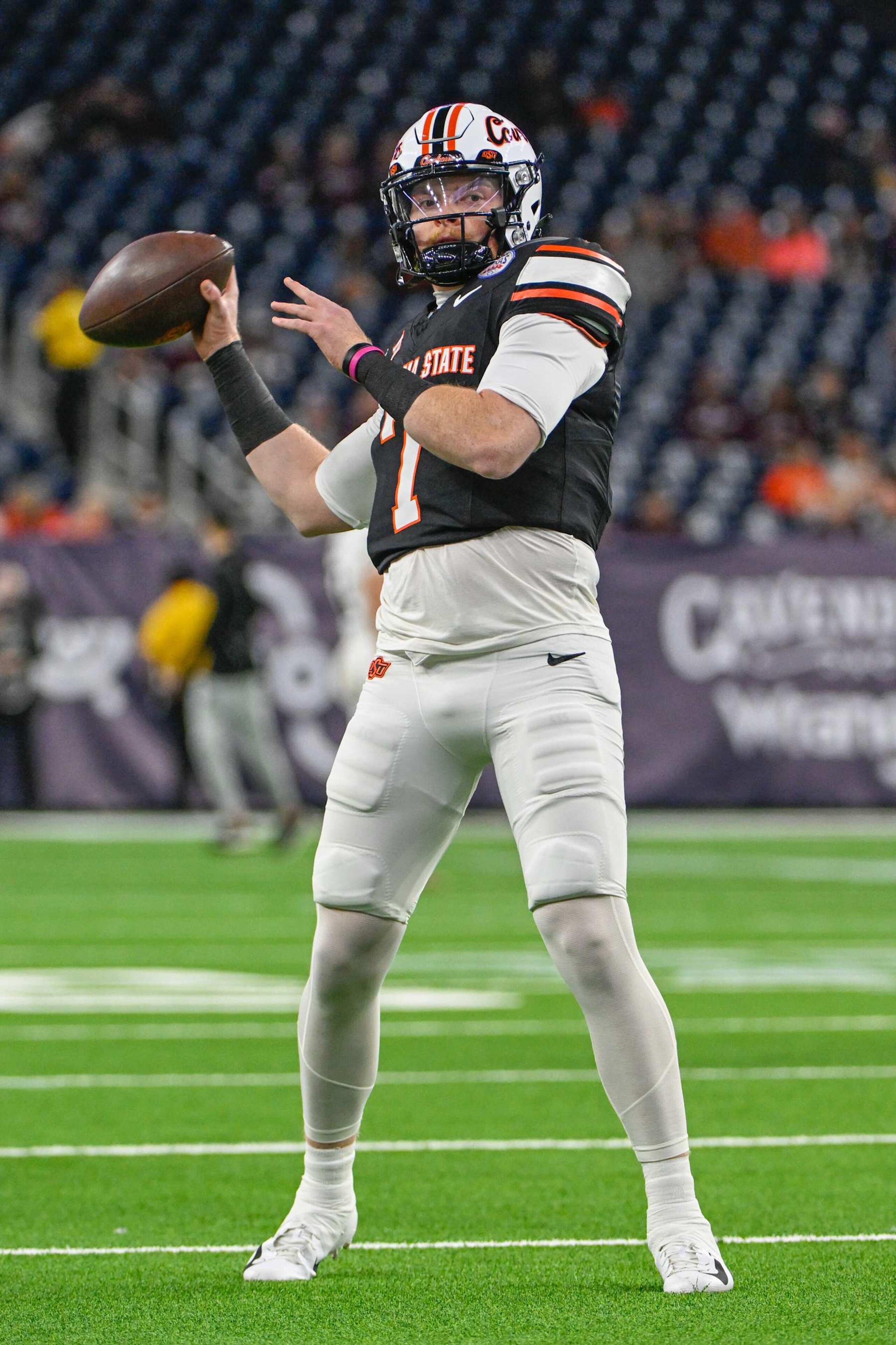 HOUSTON, TX - DECEMBER 27: Oklahoma State Cowboys quarterback Alan Bowman (7) warms up before the TaxAct Texas Bowl between the Texas A&M Aggies and Oklahoma State Cowboys at NRG Stadium on December 27, 2023 in Houston, Texas. (Photo by Ken Murray/Icon Sportswire via Getty Images)