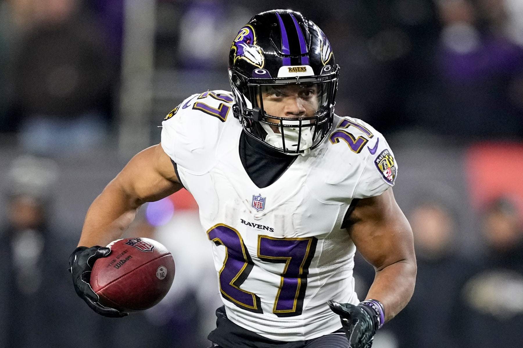 CINCINNATI, OHIO - JANUARY 15: J.K. Dobbins #27 of the Baltimore Ravens carries the ball against the Cincinnati Bengals during the second half in the AFC Wild Card playoff game at Paycor Stadium on January 15, 2023 in Cincinnati, Ohio. (Photo by Dylan Buell/Getty Images)