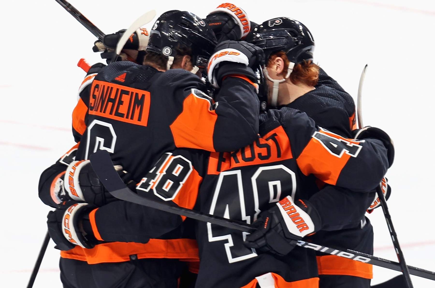 PHILADELPHIA, PENNSYLVANIA - MARCH 19: Owen Tippett #74(right) of the Philadelphia Flyers celebrates his first period goal against the Toronto Maple Leafs with Travis Sanheim #6 and Morgan Frost #48 at the Wells Fargo Center on March 19, 2024 in Philadelphia, Pennsylvania. (Photo by Len Redkoles/NHLI via Getty Images)