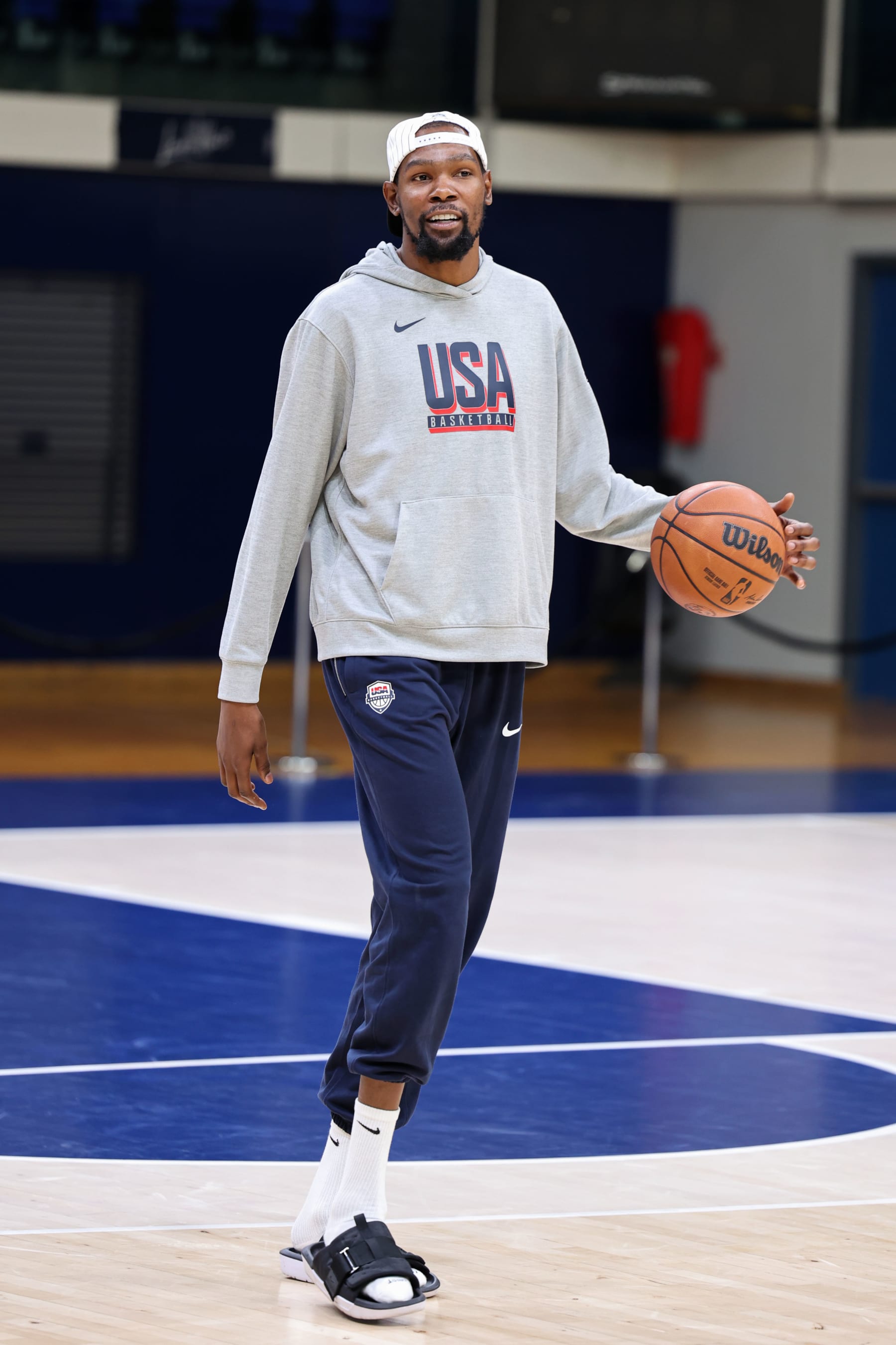 PARIS, FRANCE - JULY 25: Kevin Durant #7 of Team USA smiles during the USA Men's National Team practice at Palais des Sports Marcel-Cerdan on July 25, 2024 in Paris, France. NOTE TO USER: User expressly acknowledges and agrees that, by downloading and/or using this photograph, user is consenting to the terms and conditions of the Getty Images License Agreement. Mandatory Copyright Notice: Copyright 2024 NBAE (Photo by Brian Choi/NBAE via Getty Images)