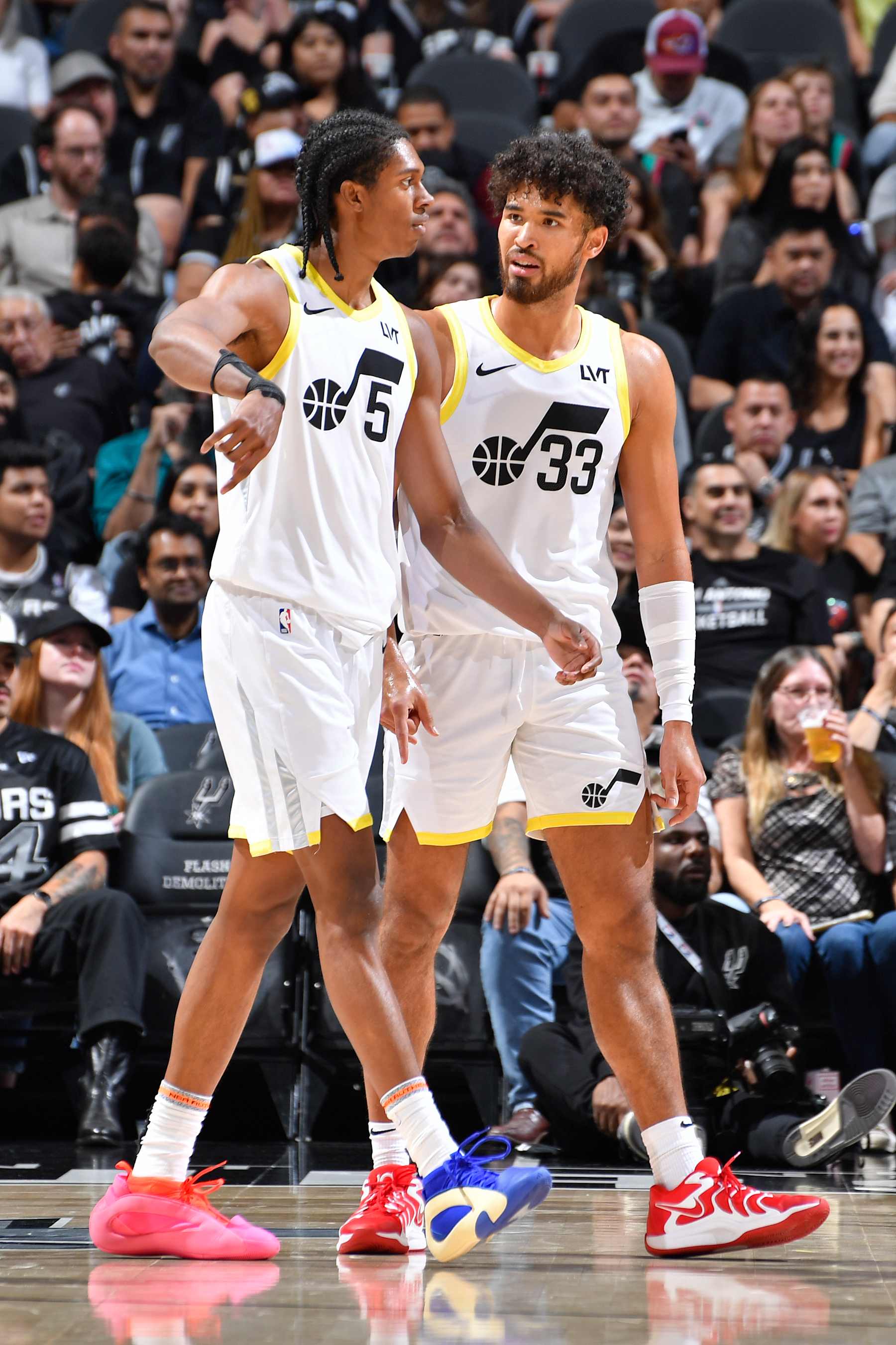 SAN ANTONIO, TX - NOVEMBER 9:  Cody Williams #5 of the Utah Jazz and Johnny Juzang #33 of the Utah Jazz looks on during the game against the San Antonio Spurs on November 9, 2024 at the Frost Bank Center in San Antonio, Texas. NOTE TO USER: User expressly acknowledges and agrees that, by downloading and or using this photograph, user is consenting to the terms and conditions of the Getty Images License Agreement. Mandatory Copyright Notice: Copyright 2024 NBAE (Photos by Logan Riely/NBAE via Getty Images)