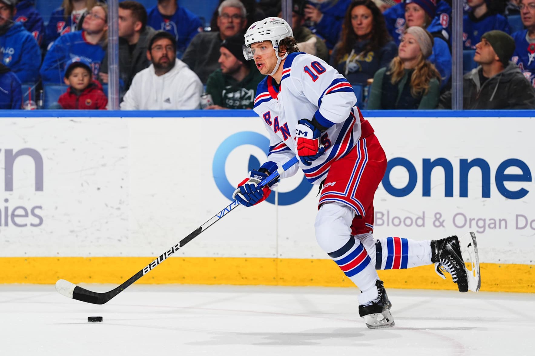 BUFFALO, NEW YORK - DECEMBER 11: Artemi Panarin #10 of the New York Rangers looks to make a play with the puck against against the Buffalo Sabres during the second period of an NHL game on December 11, 2024 at KeyBank Center in Buffalo, New York. (Photo by Ben Ludeman/NHLI via Getty Images)