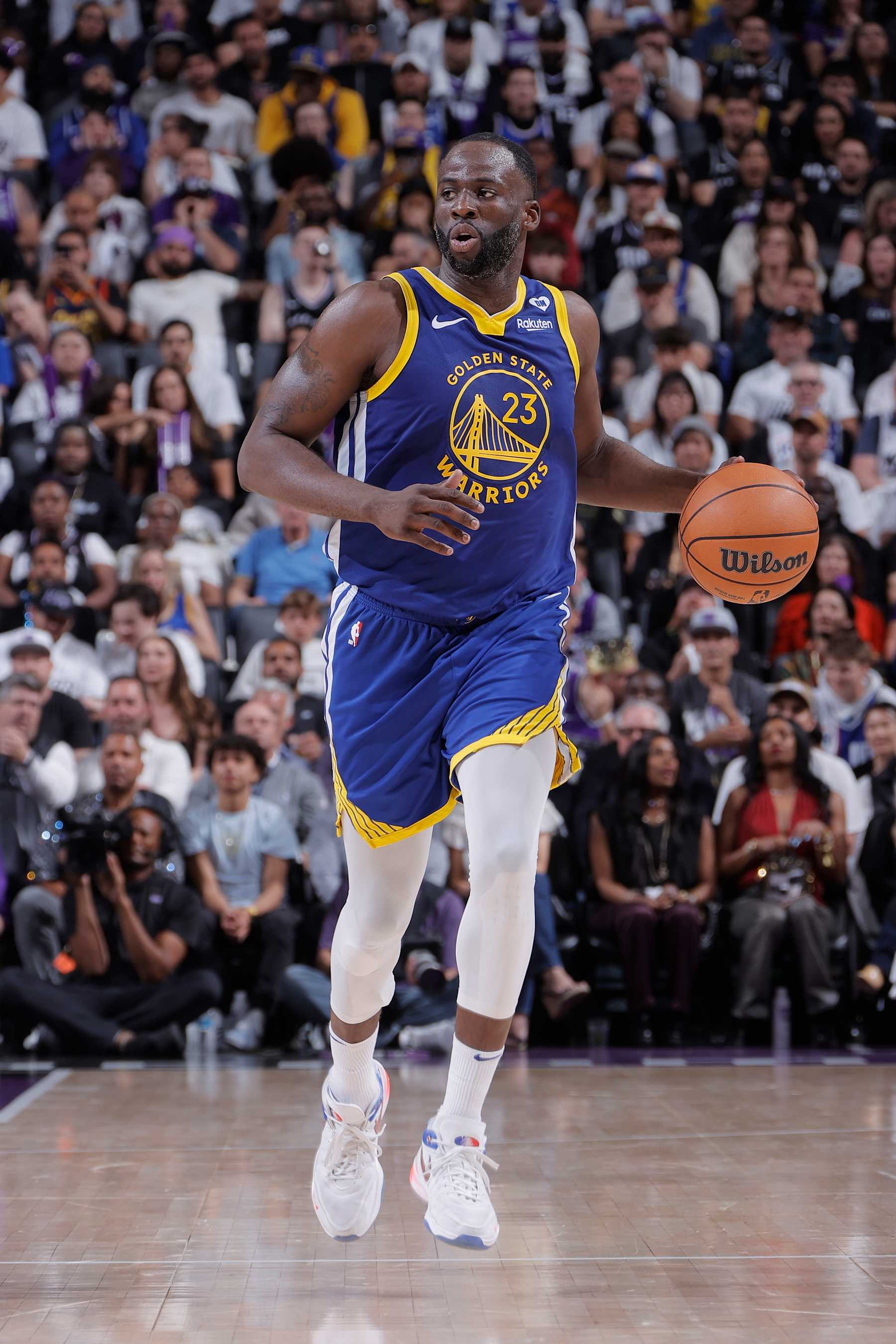SACRAMENTO, CA - APRIL 16: Draymond Green #23 of the Golden State Warriors dribbles the ball during the game against the Sacramento Kings during the 2024 Play-In Tournament on April 16, 2024 at Golden 1 Center in Sacramento, California. NOTE TO USER: User expressly acknowledges and agrees that, by downloading and or using this Photograph, user is consenting to the terms and conditions of the Getty Images License Agreement. Mandatory Copyright Notice: Copyright 2024 NBAE (Photo by Rocky Widner/NBAE via Getty Images) SACRAMENTO, CA - APRIL 16: Draymond Green #23 of the Golden State Warriors dribbles the ball during the game against the Sacramento Kings during the 2024 Play-In Tournament on April 16, 2024 at Golden 1 Center in Sacramento, California. NOTE TO USER: User expressly acknowledges and agrees that, by downloading and or using this Photograph, user is consenting to the terms and conditions of the Getty Images License Agreement. Mandatory Copyright Notice: Copyright 2024 NBAE (Photo by Rocky Widner/NBAE via Getty Images)