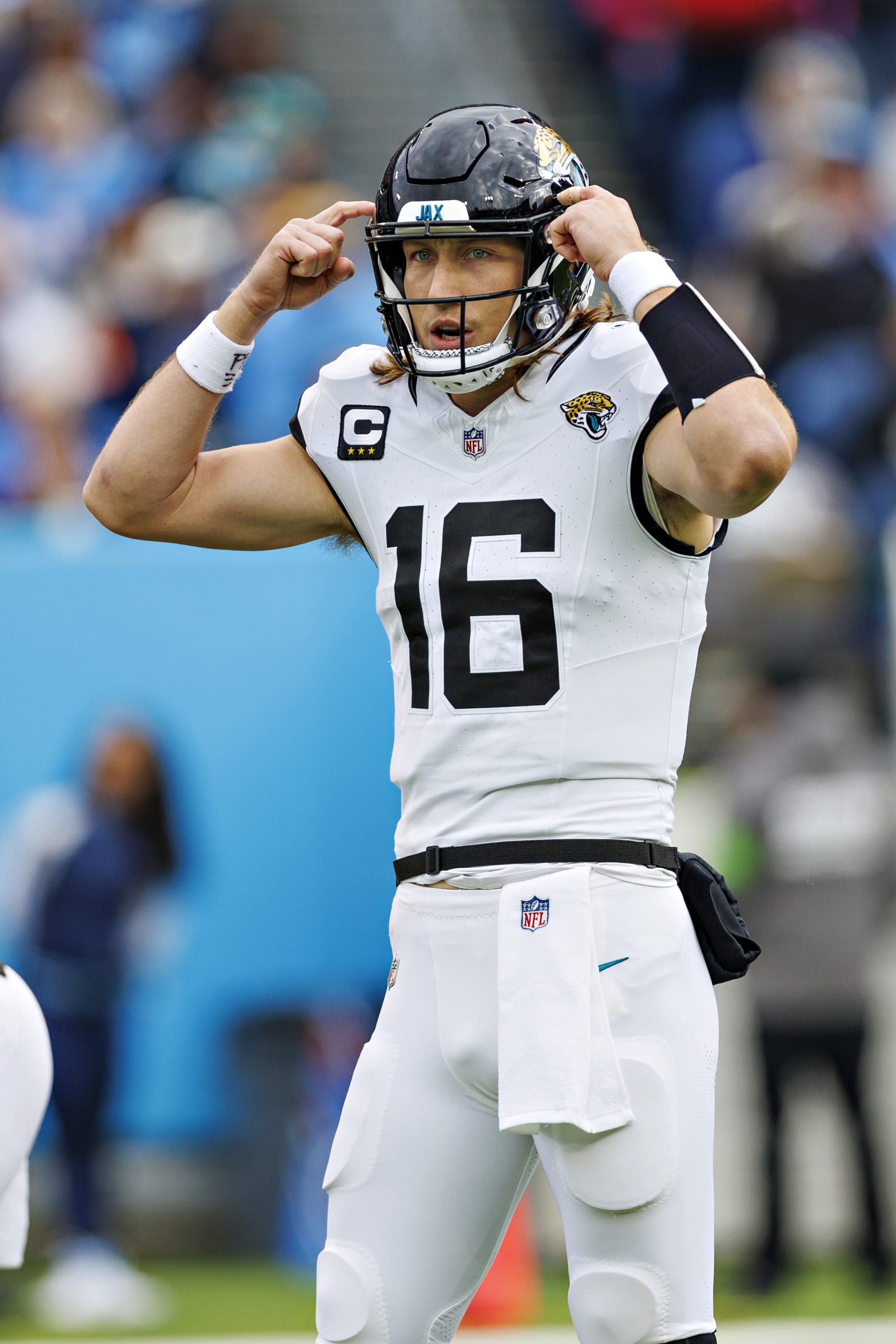NASHVILLE TENNESSEE - JANUARY 07: Trevor Lawrence #16 of the Jacksonville Jaguars signals the play during the game against the Tennessee Titans in Nashville, Tennessee at Nissan Stadium on January 7, 2024 in Houston, Texas. The Titans defeated the Jaguars 28-20.  (Photo by Wesley Hitt/Getty Images)