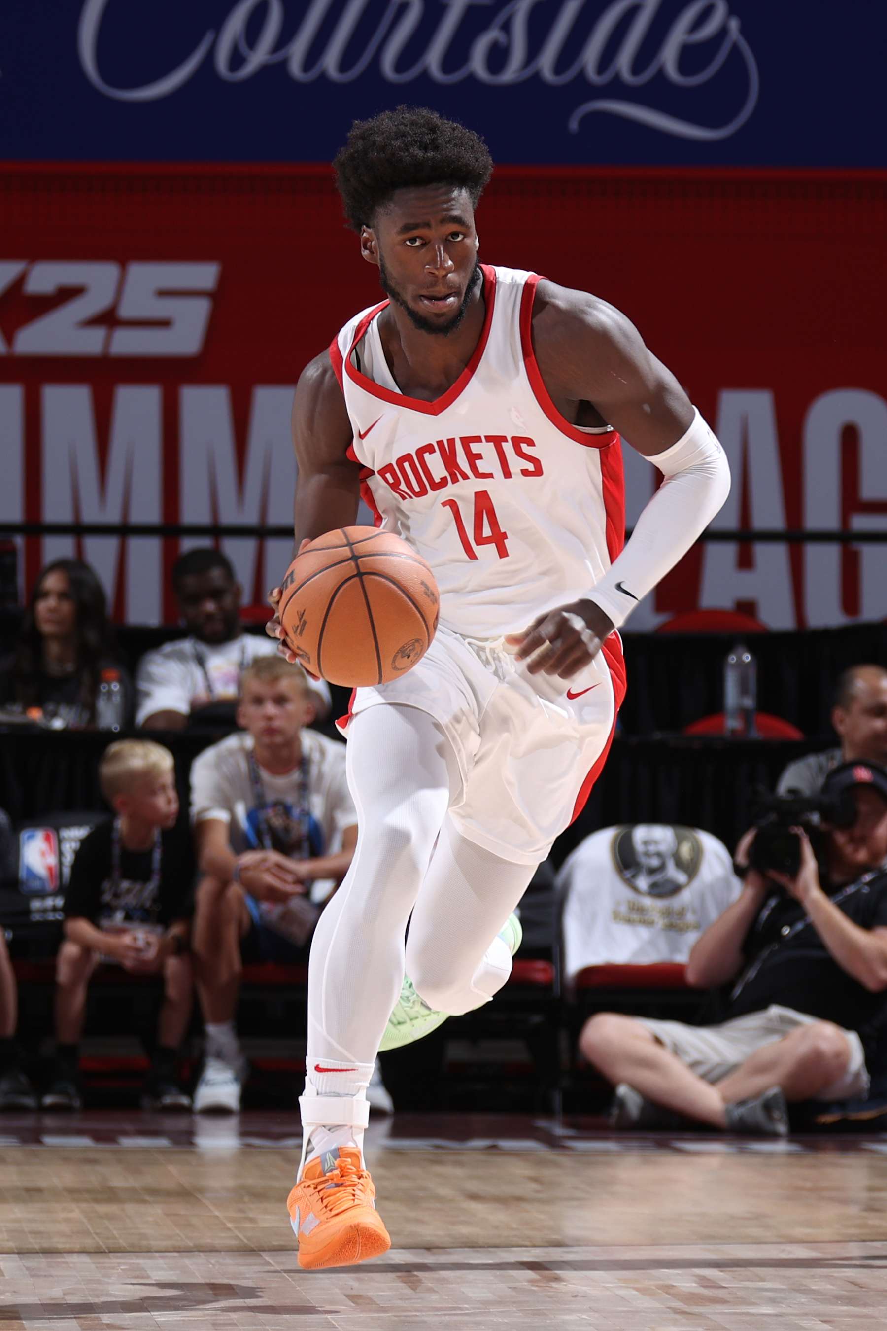 LAS VEGAS, NV - JULY 15: AJ Griffin #14 of the Houston Rockets dribbles the ball during the game against the Detroit Pistons on July 15, 2024 at the Thomas & Mack Center in Las Vegas, Nevada. NOTE TO USER: User expressly acknowledges and agrees that, by downloading and or using this photograph, User is consenting to the terms and conditions of the Getty Images License Agreement. Mandatory Copyright Notice: Copyright 2024 NBAE (Photo by Stephen Gosling/NBAE via Getty Images)