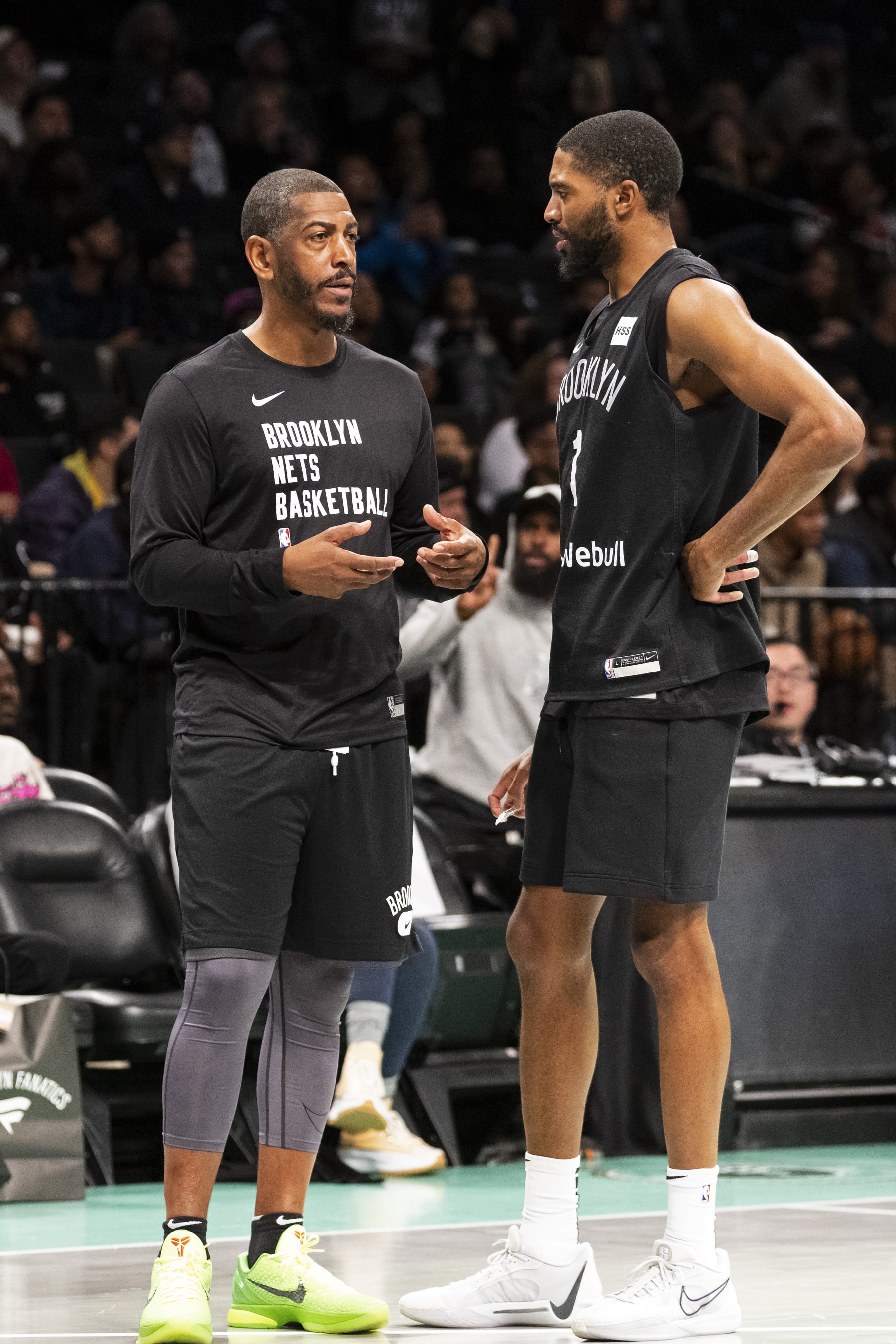 NEW YORK, NY - OCTOBER 14: Assistant Coach Kevin Ollie and Mikal Bridges #1 of the Brooklyn Nets talk during Practice in The Park October 14, 2023 at the Barclays Center, Brooklyn, New York. NOTE TO USER: User expressly acknowledges and agrees that, by downloading and or using this photograph, User is consenting to the terms and conditions of the Getty Images License Agreement. Mandatory Copyright Notice: Copyright 2023 NBAE (Photo by Kostas Lymperopoulos/NBAE via Getty Images)