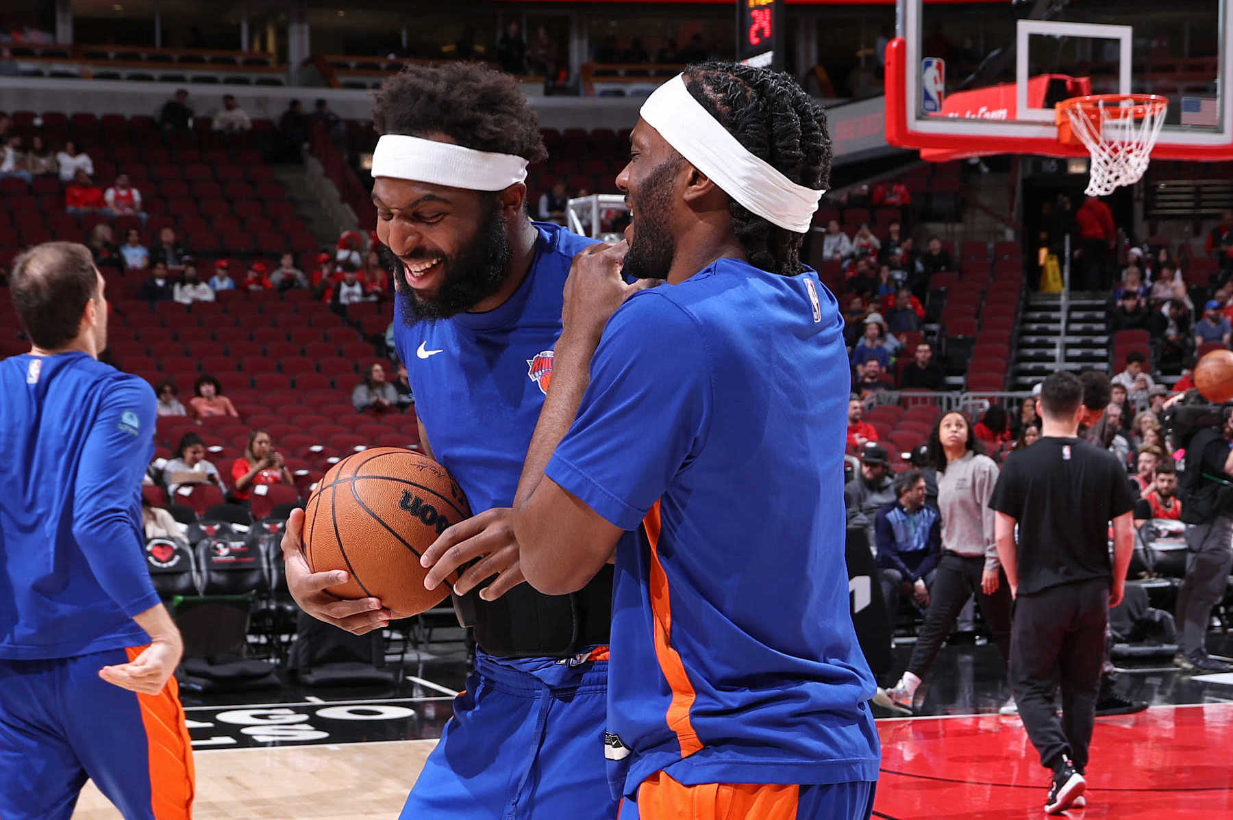 CHICAGO, IL - APRIL 9: Mitchell Robinson #23 and Precious Achiuwa #5 of the New York Knicks embrace before the game against the Chicago Bulls on April 9, 2024 at United Center in Chicago, Illinois. NOTE TO USER: User expressly acknowledges and agrees that, by downloading and or using this photograph, User is consenting to the terms and conditions of the Getty Images License Agreement. Mandatory Copyright Notice: Copyright 2024 NBAE (Photo by Jeff Haynes/NBAE via Getty Images)