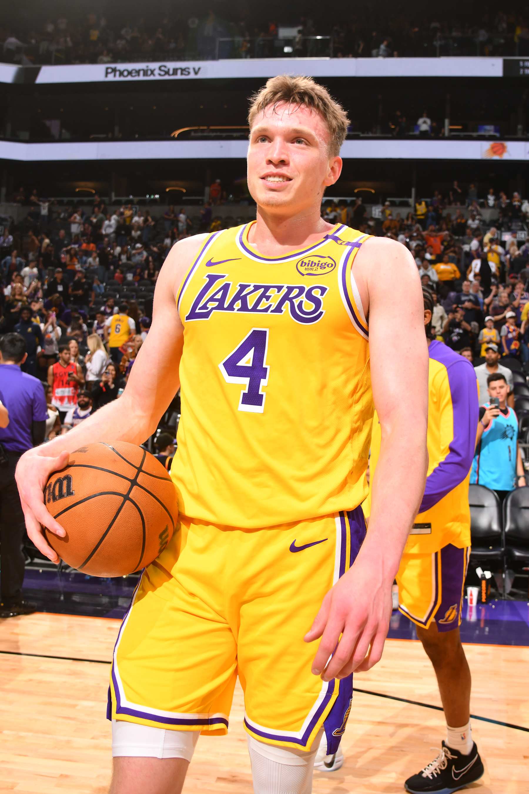 PHOENIX, AZ - OCTOBER 17: Dalton Knecht #4 of the Los Angeles Lakers smiles after the game against the Phoenix Suns during a NBA Preseason game on October 17, 2024 at Footprint Center in Phoenix, Arizona. NOTE TO USER: User expressly acknowledges and agrees that, by downloading and or using this photograph, user is consenting to the terms and conditions of the Getty Images License Agreement. Mandatory Copyright Notice: Copyright 2024 NBAE (Photo by Barry Gossage/NBAE via Getty Images)