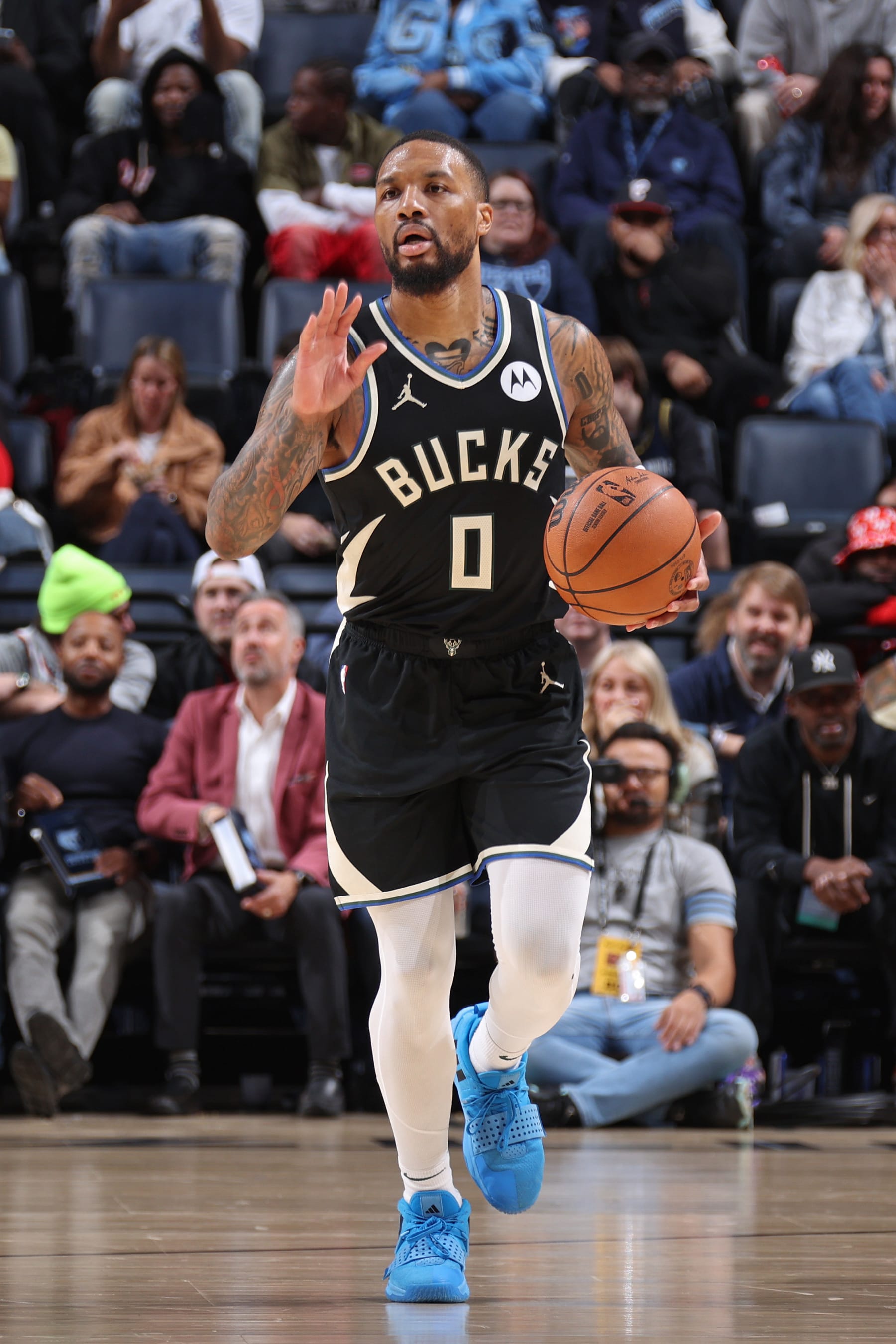 MEMPHIS, TN - FEBRUARY 15: Damian Lillard #0 of the Milwaukee Bucks brings the ball up court during the game against the Memphis Grizzlies on February 15, 2024 at FedExForum in Memphis, Tennessee. NOTE TO USER: User expressly acknowledges and agrees that, by downloading and or using this photograph, User is consenting to the terms and conditions of the Getty Images License Agreement. Mandatory Copyright Notice: Copyright 2024 NBAE (Photo by Stephen Gosling/NBAE via Getty Images)