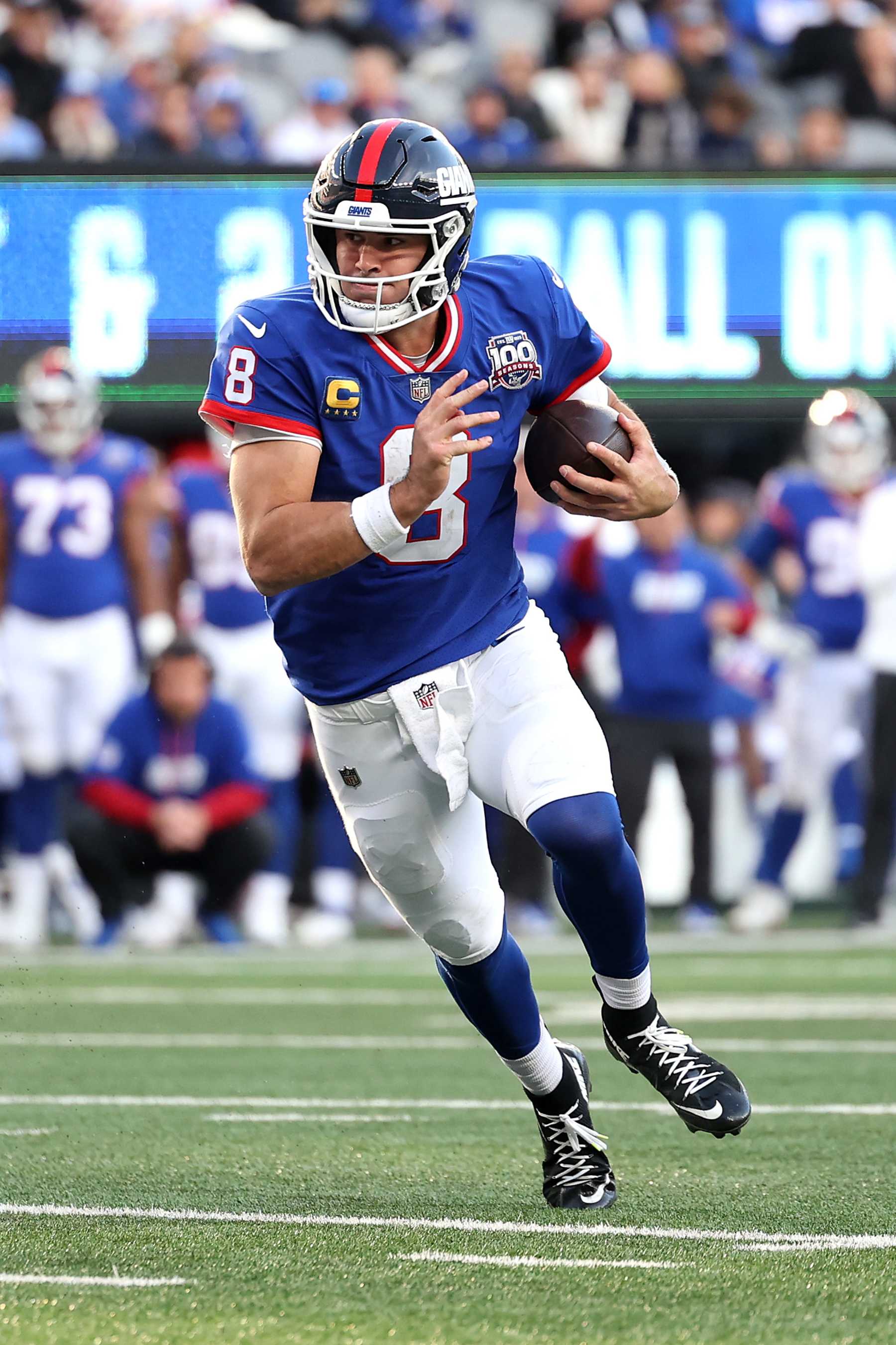 EAST RUTHERFORD, NEW JERSEY - NOVEMBER 03: Daniel Jones #8 of the New York Giants runs in a touchdown during the fourth quarter against the Washington Commanders at MetLife Stadium on November 03, 2024 in East Rutherford, New Jersey. (Photo by Luke Hales/Getty Images)