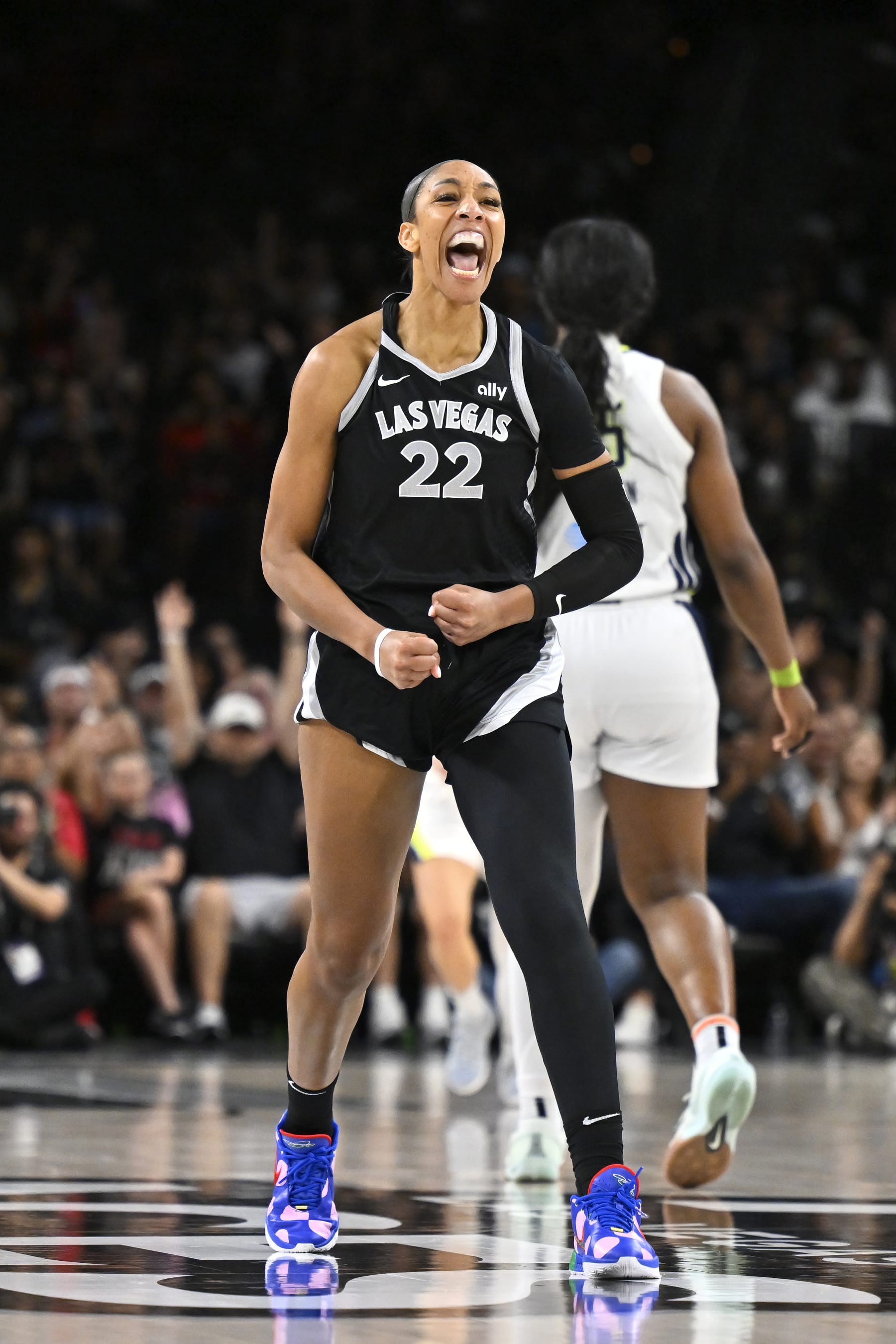 LAS VEGAS, NV - JULY 7: A'ja Wilson #22 of the Las Vegas Aces celebrates becoming the Las Vegas Aces' all-time leading scorer during the game against the Dallas Wings on July 7, 2024 at Michelob Ultra Arena in Las Vegas, Nevada. NOTE TO USER: User expressly acknowledges and agrees that, by downloading and or using this Photograph, user is consenting to the terms and conditions of the Getty Images License Agreement. Mandatory Copyright Notice: Copyright 2024 NBAE (Photo by David Becker/NBAE via Getty Images)