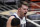 Dallas Mavericks guard Luka Doncic, top, celebrates after scoring as Los Angeles Clippers forward Marcus Morris Sr. looks on during the first half in Game 1 of an NBA basketball first-round playoff series Saturday, May 22, 2021, in Los Angeles. (AP Photo/Mark J. Terrill)