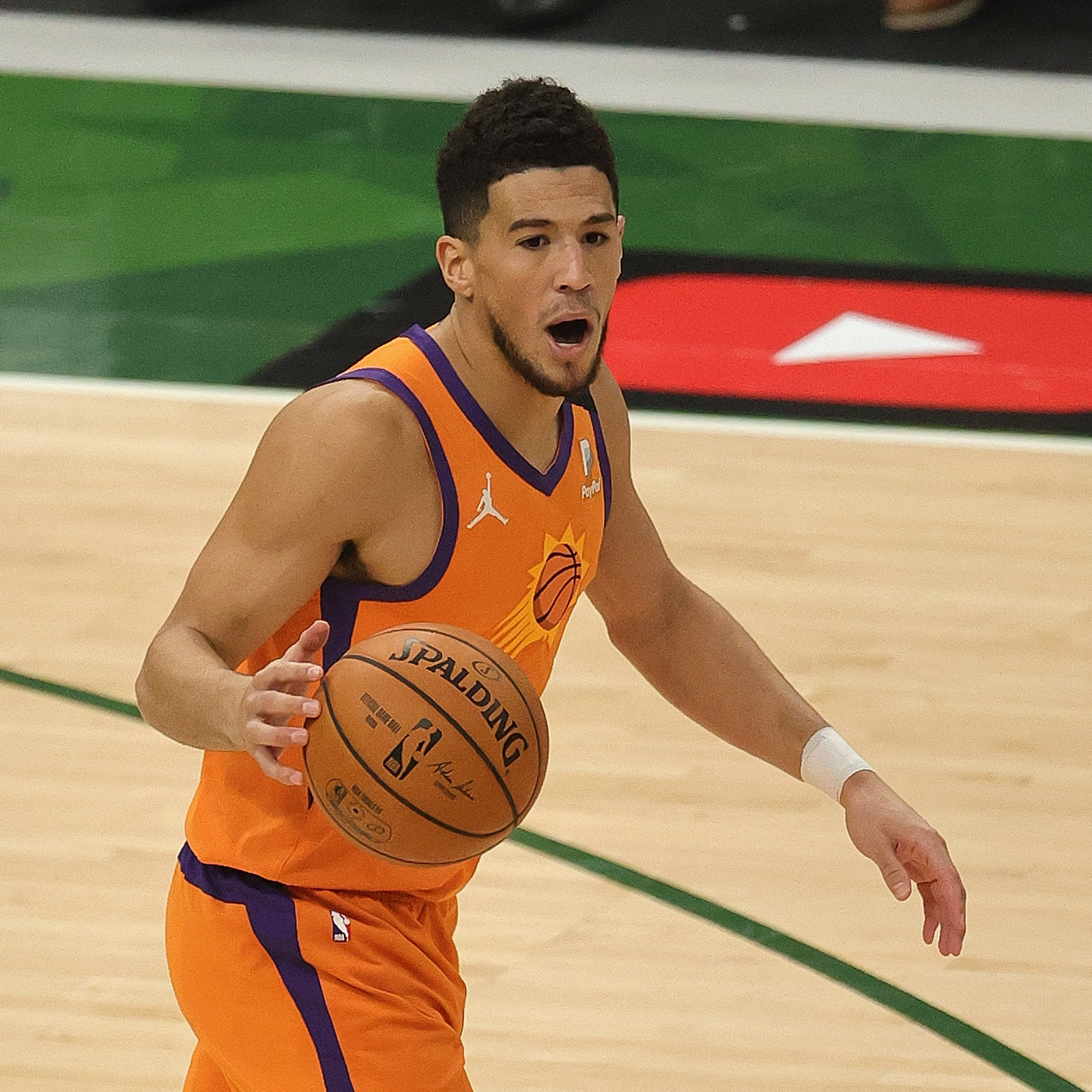 Suns' Devin Booker will miss start of camp due to health protocols