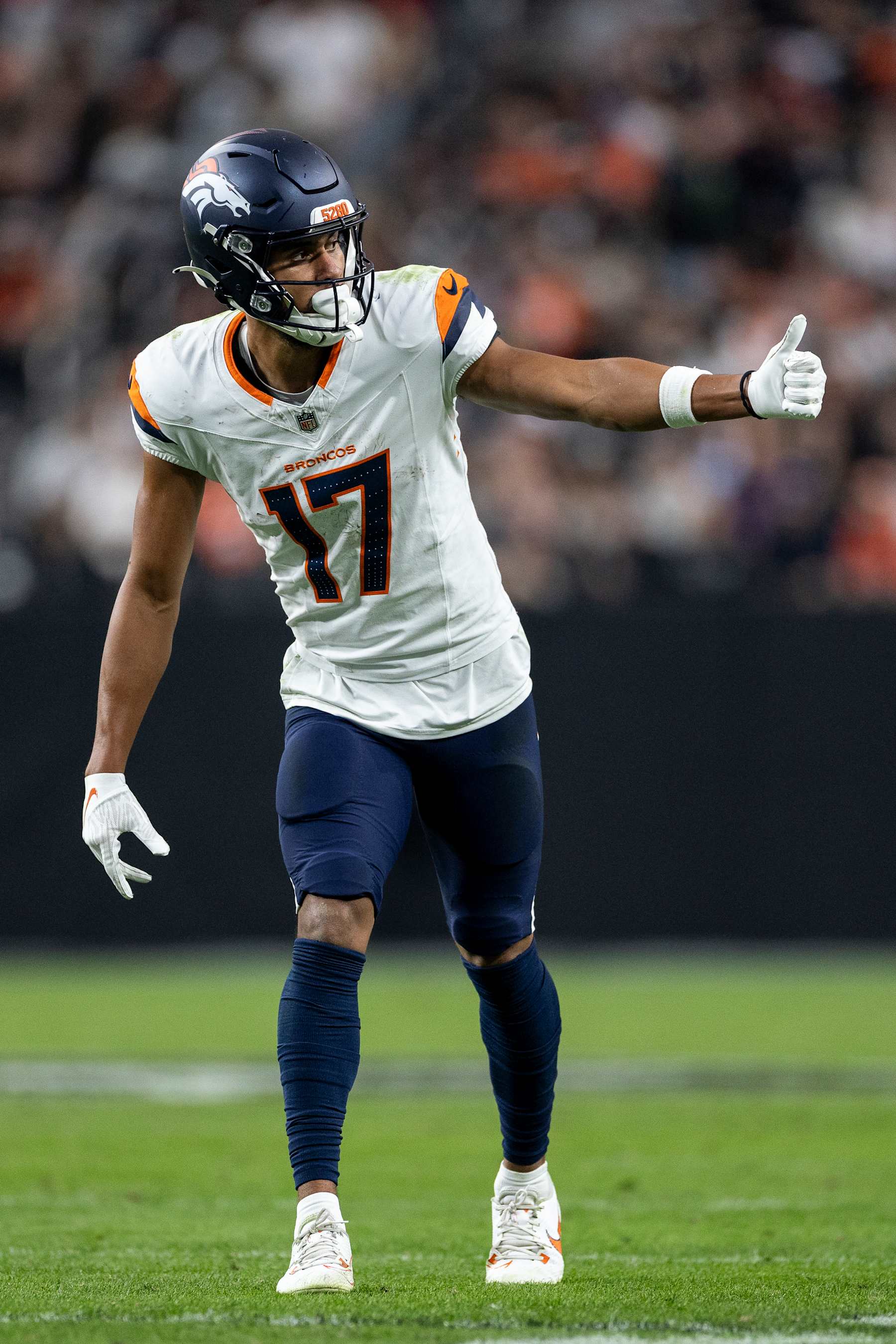 LAS VEGAS, NEVADA - NOVEMBER 24: Devaughn Vele #17 of the Denver Broncos signals as he lines up during an NFL Football game against the Las Vegas Raiders at Allegiant Stadium on November 24, 2024 in Las Vegas, Nevada. (Photo by Michael Owens/Getty Images)