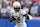 KANSAS CITY, MO - NOVEMBER 23: Colorado Buffaloes wide receiver Travis Hunter (12) looks to stiff arm a defender during a catch and run in the second quarter of a Big 12 game between the Colorado Buffaloes and Kansas Jayhawks on November 23, 2024 at GEHA Field at Arrowhead Stadium in Kansas City, MO. (Photo by Scott Winters/Icon Sportswire via Getty Images)