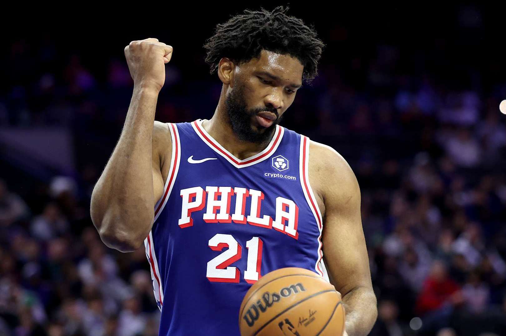PHILADELPHIA, PENNSYLVANIA - FEBRUARY 04: Joel Embiid #21 of the Philadelphia 76ers reacts to a foul during the first half of the game against the Dallas Mavericks at the Wells Fargo Center on February 04, 2025 in Philadelphia, Pennsylvania. NOTE TO USER: User expressly acknowledges and agrees that, by downloading and or using this photograph, User is consenting to the terms and conditions of the Getty Images License Agreement. (Photo by Emilee Chinn/Getty Images)