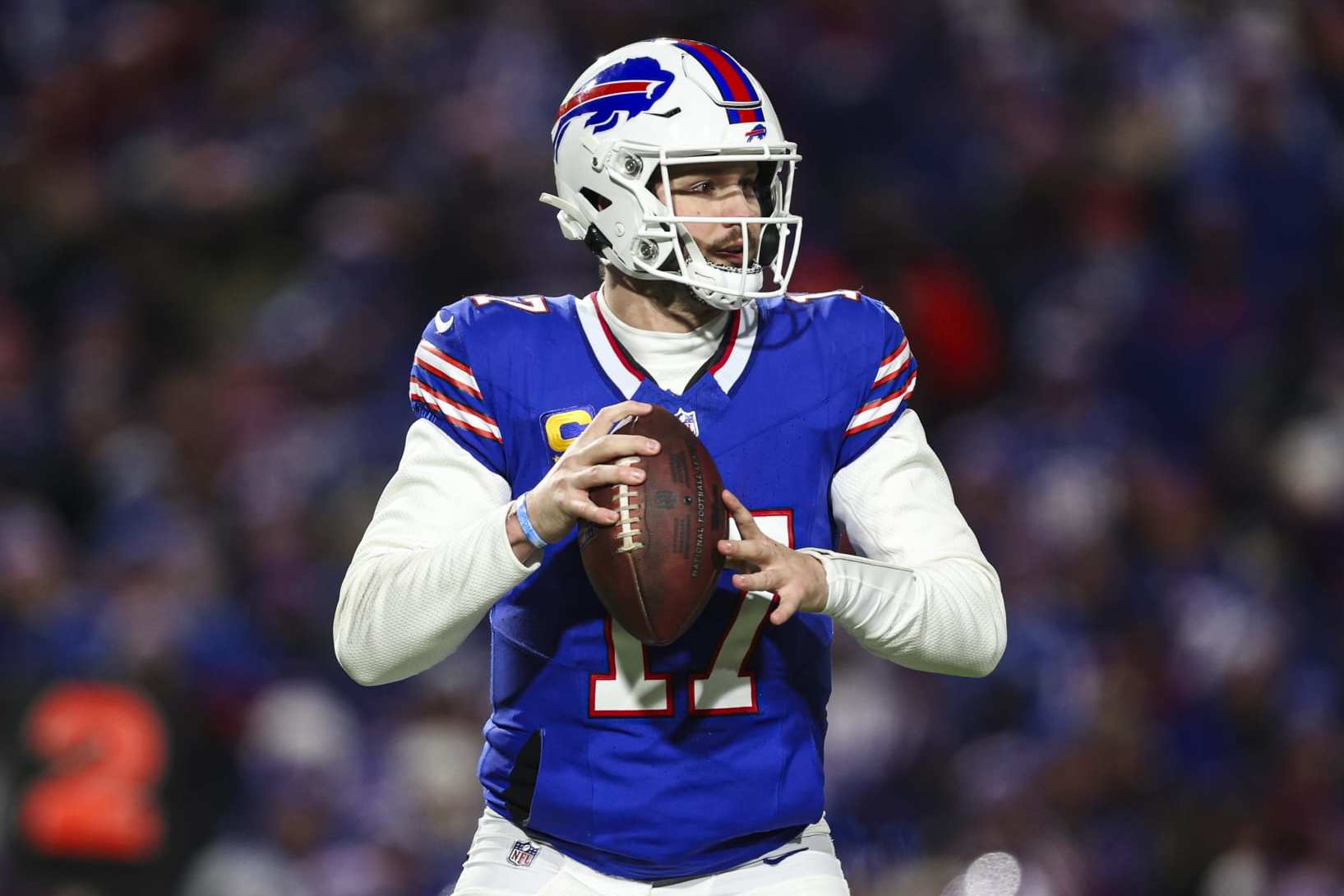 ORCHARD PARK, NY - JANUARY 21: Josh Allen #17 of the Buffalo Bills drops back to pass during an NFL divisional round playoff football game against the Kansas City Chiefs at Highmark Stadium on January 21, 2024 in Orchard Park, New York. (Photo by Perry Knotts/Getty Images)