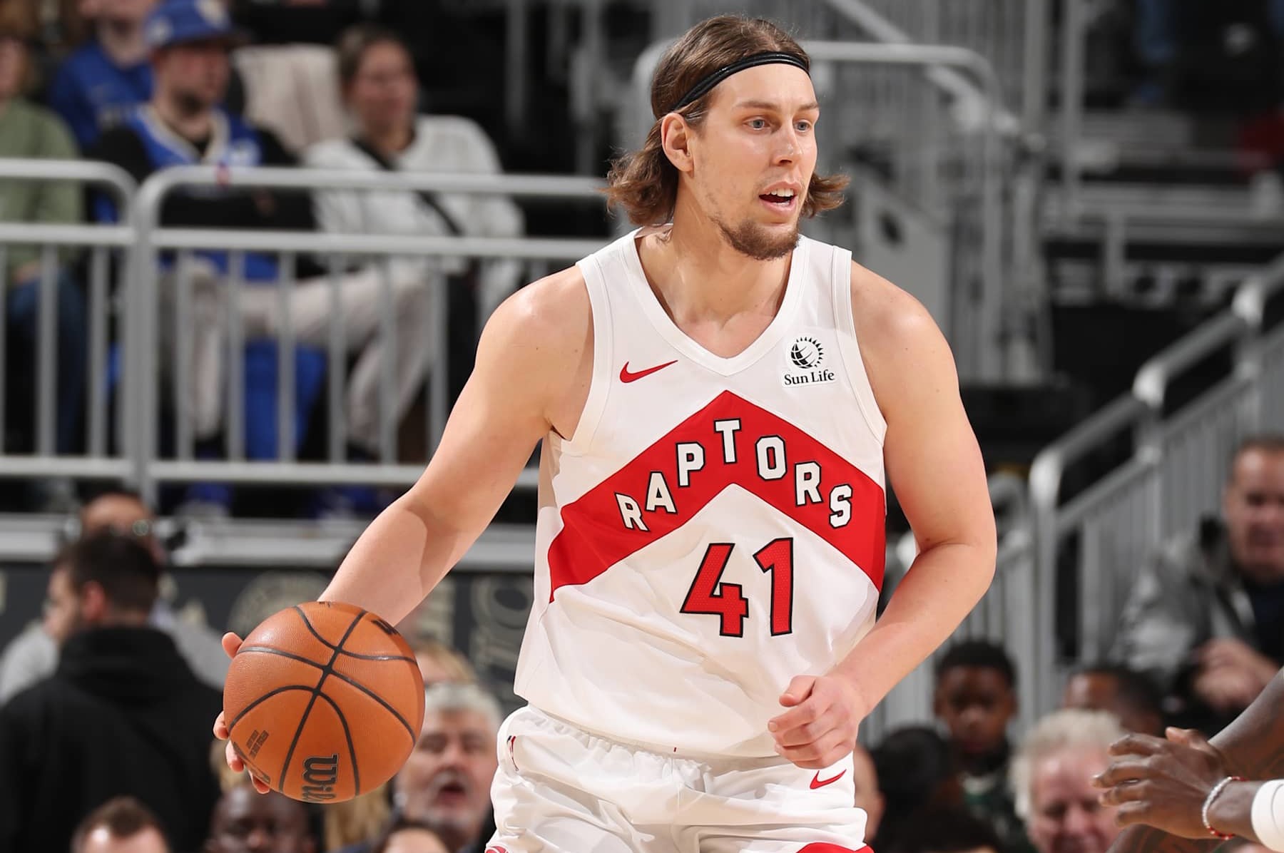 MILWAUKEE, WI - JANUARY 17: Kelly Olynyk #41 of the Toronto Raptors dribbles the ball during the game against the Milwaukee Bucks on January 17, 2025 at Fiserv Forum Center in Milwaukee, Wisconsin. NOTE TO USER: User expressly acknowledges and agrees that, by downloading and or using this Photograph, user is consenting to the terms and conditions of the Getty Images License Agreement. Mandatory Copyright Notice: Copyright 2025 NBAE (Photo by Gary Dineen/NBAE via Getty Images).