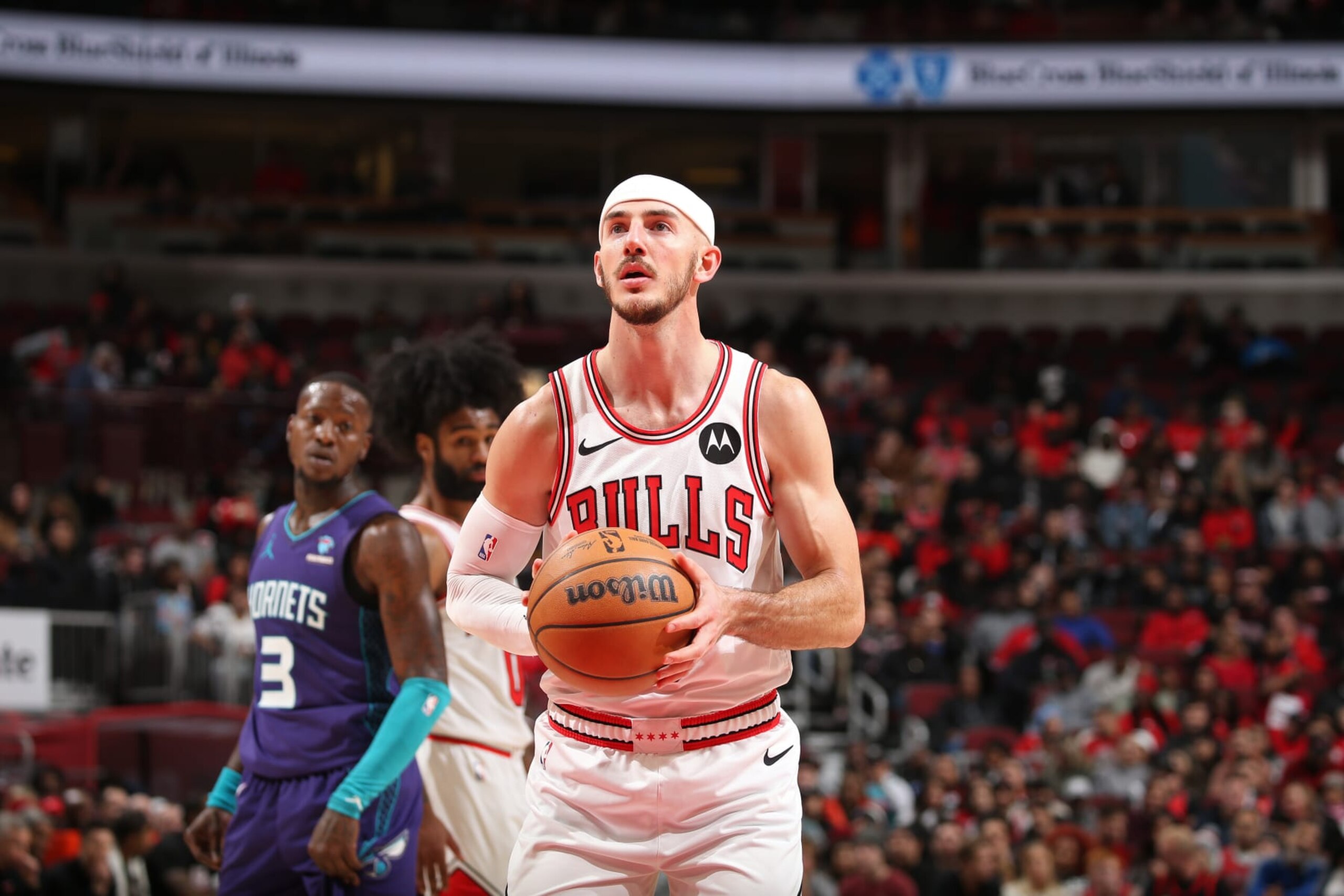 CHICAGO, IL - DECEMBER 6: Alex Caruso #6 of the Chicago Bulls shoots a free throw during the game against the Charlotte Hornets on December 6, 2023 at the United Center in Chicago, Illinois. NOTE TO USER: User expressly acknowledges and agrees that, by downloading and or using this Photograph, user is consenting to the terms and conditions of the Getty Images License Agreement. Mandatory Copyright Notice: Copyright 2023 NBAE (Photo by Gary Dineen/NBAE via Getty Images). CHICAGO, IL - DECEMBER 6: Alex Caruso #6 of the Chicago Bulls shoots a free throw during the game against the Charlotte Hornets on December 6, 2023 at the United Center in Chicago, Illinois. NOTE TO USER: User expressly acknowledges and agrees that, by downloading and or using this Photograph, user is consenting to the terms and conditions of the Getty Images License Agreement. Mandatory Copyright Notice: Copyright 2023 NBAE (Photo by Gary Dineen/NBAE via Getty Images).
