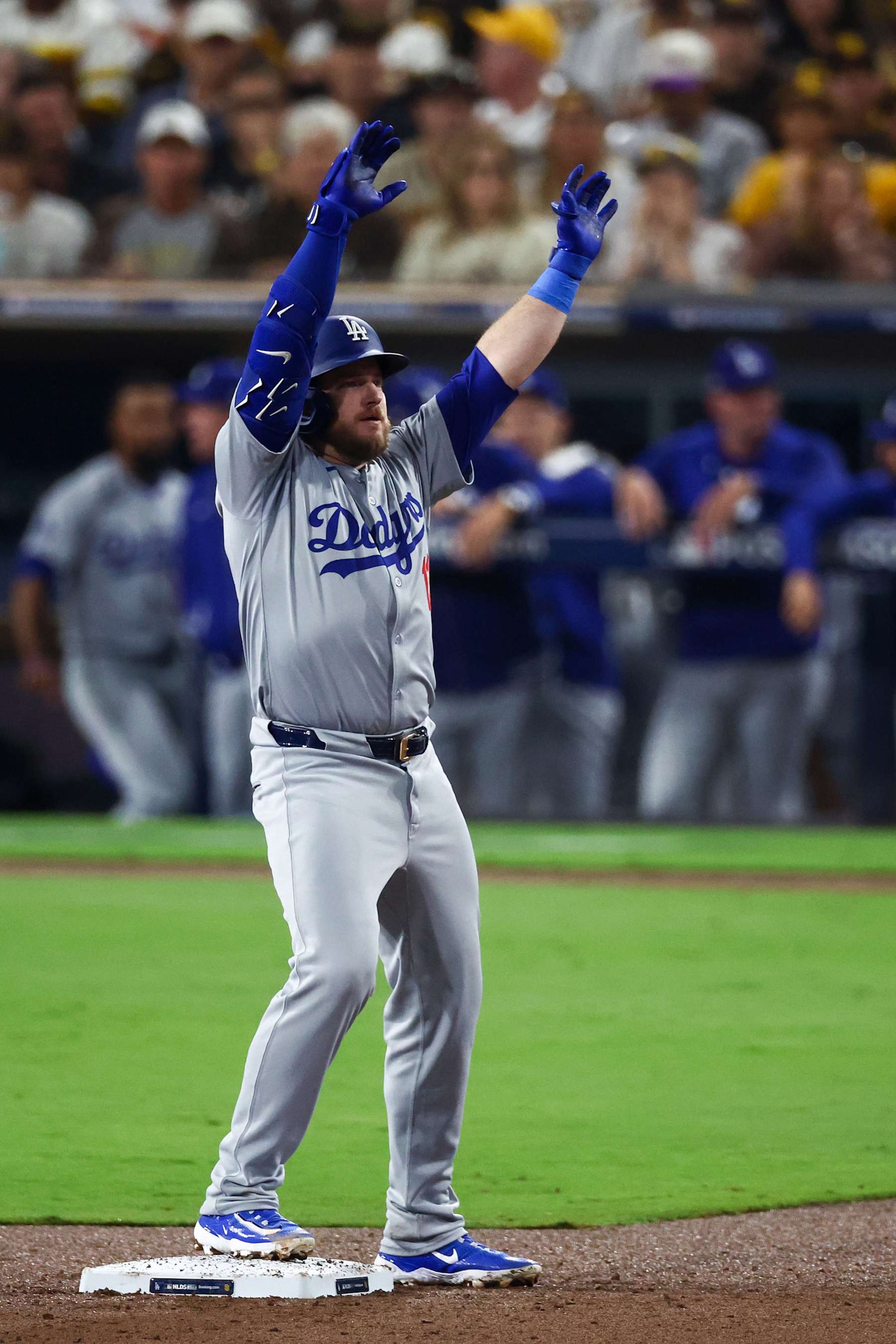 SAN DIEGO, CALIFORNIA - OCTOBER 09: Max Muncy #13 of the Los Angeles Dodgers after hitting a double in the third inning during Game Four of the Division Series against the San Diego Padres at Petco Park on October 09, 2024 in San Diego, California. (Photo by Katelyn Mulcahy/Getty Images) SAN DIEGO, CALIFORNIA - OCTOBER 09: Max Muncy #13 of the Los Angeles Dodgers after hitting a double in the third inning during Game Four of the Division Series against the San Diego Padres at Petco Park on October 09, 2024 in San Diego, California. (Photo by Katelyn Mulcahy/Getty Images)
