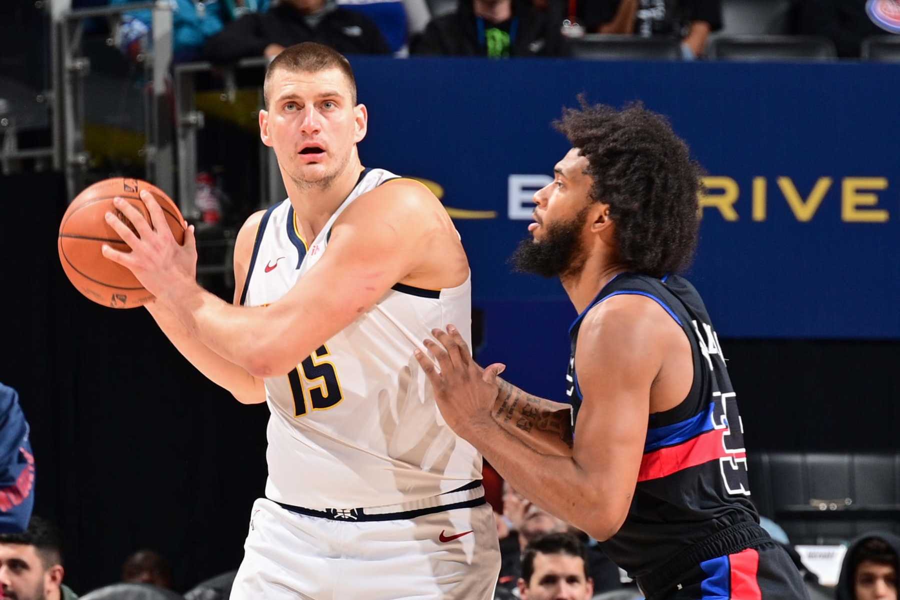 DETROIT, MI - NOVEMBER 20: Nikola Jokic #15 of the Denver Nuggets handles the ball during the game  on November 20, 2023 at Little Caesars Arena in Detroit, Michigan. NOTE TO USER: User expressly acknowledges and agrees that, by downloading and/or using this photograph, User is consenting to the terms and conditions of the Getty Images License Agreement. Mandatory Copyright Notice: Copyright 2023 NBAE (Photo by Chris Schwegler/NBAE via Getty Images)