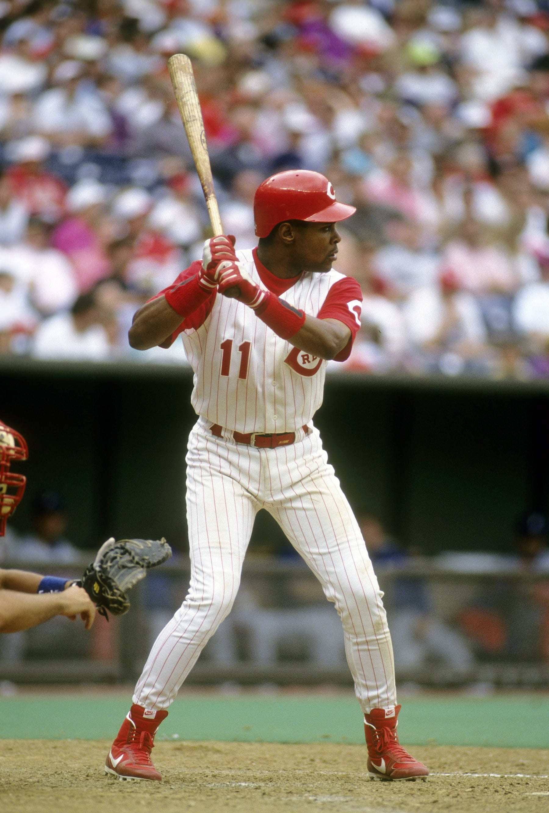 CINCINNATI, OH - CIRCA 1990's: Shortstop Barry Larkin #11 of the Cincinnati Reds in action at the plate waiting on the pitch during a  MLB baseball game circa 1990's at Riverfront Stadium in Cincinnati, Ohio. Larkin played for the Reds from 1986-04. (Photo by Focus on Sport/Getty Images)