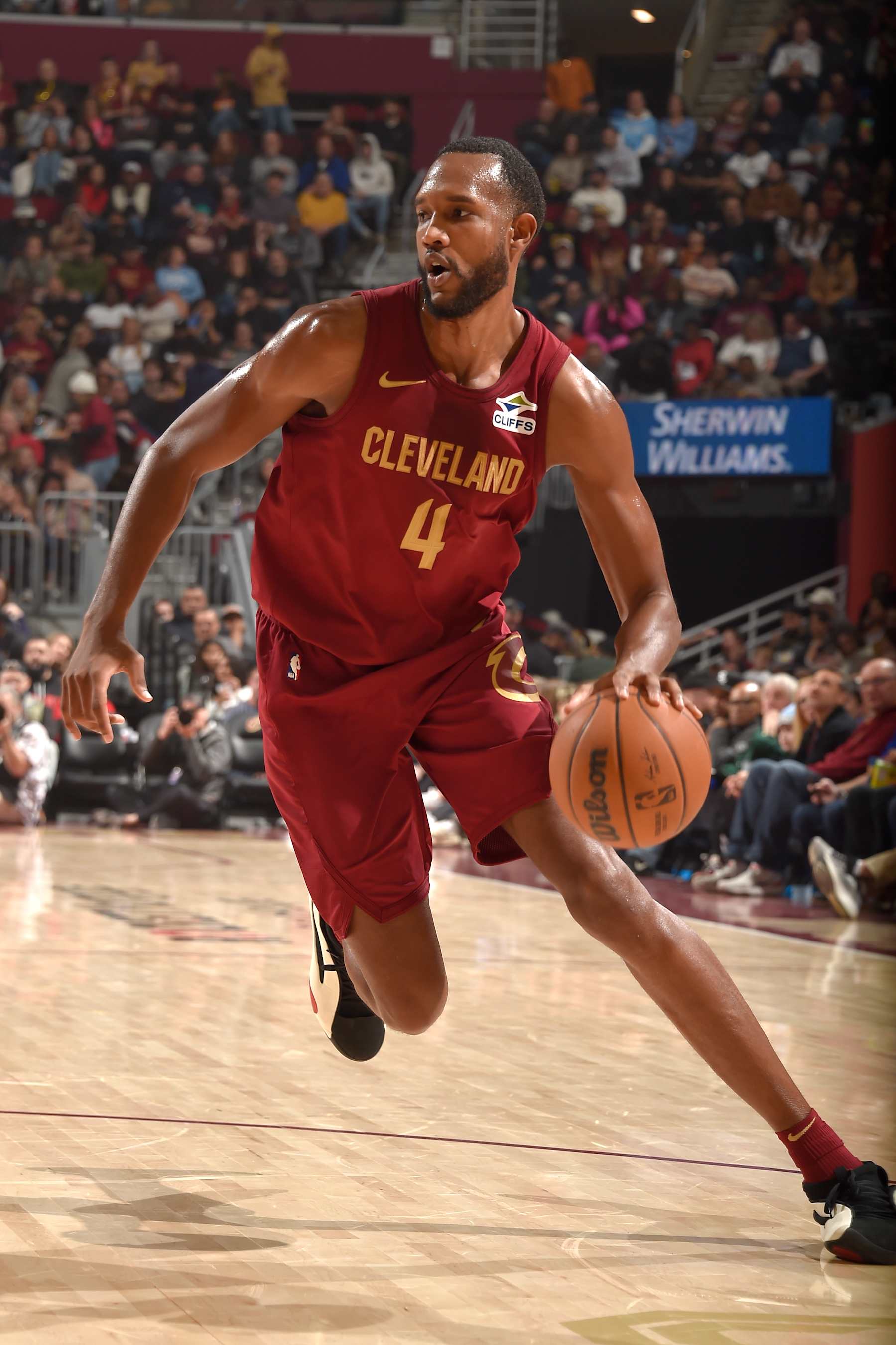 CLEVELAND, OH - JANUARY 5: Evan Mobley #4 of the Cleveland Cavaliers handles the ball during the game against the Charlotte Hornets on January 5, 2025 at Rocket Mortgage FieldHouse in Cleveland, Ohio. NOTE TO USER: User expressly acknowledges and agrees that, by downloading and/or using this Photograph, user is consenting to the terms and conditions of the Getty Images License Agreement. Mandatory Copyright Notice: Copyright 2025 NBAE (Photo by David Liam Kyle/NBAE via Getty Images)