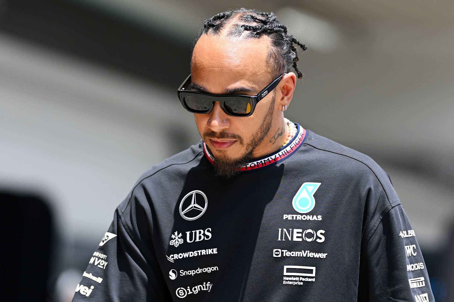 SAO PAULO, BRAZIL - OCTOBER 31: Lewis Hamilton of Great Britain and Mercedes walks in the Paddock during previews ahead of the F1 Grand Prix of Brazil at Autodromo Jose Carlos Pace on October 31, 2024 in Sao Paulo, Brazil. (Photo by Clive Mason/Getty Images)