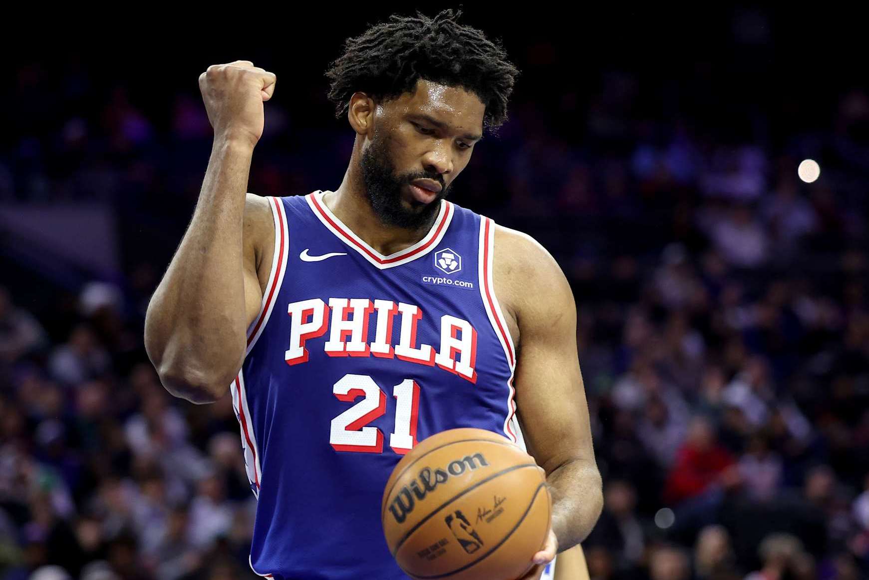 PHILADELPHIA, PENNSYLVANIA - FEBRUARY 04: Joel Embiid #21 of the Philadelphia 76ers reacts to a foul during the first half of the game against the Dallas Mavericks at the Wells Fargo Center on February 04, 2025 in Philadelphia, Pennsylvania. NOTE TO USER: User expressly acknowledges and agrees that, by downloading and or using this photograph, User is consenting to the terms and conditions of the Getty Images License Agreement. (Photo by Emilee Chinn/Getty Images)