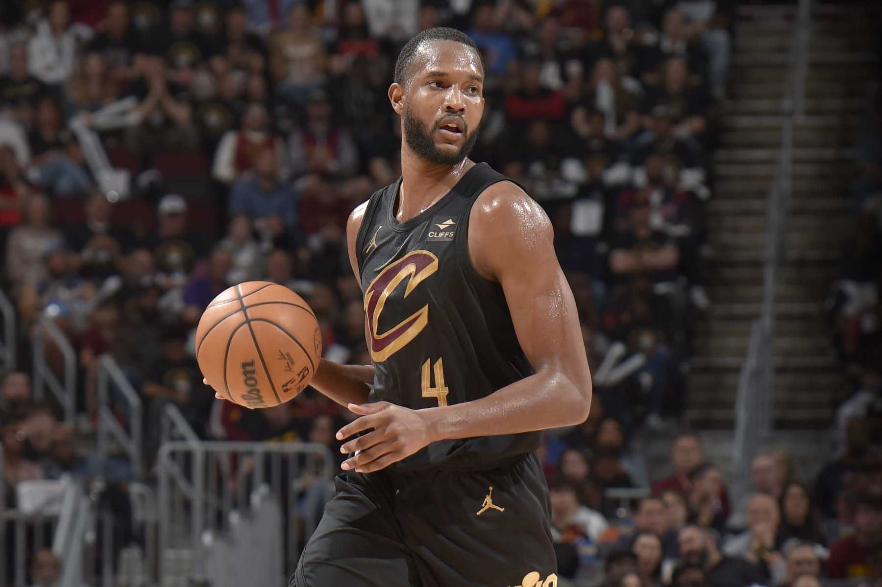 CLEVELAND, OH - APRIL 30: Evan Mobley #4 of the Cleveland Cavaliers handles the ball during the game against the Orlando Magic during Round 1 Game 5 of the 2024 NBA Playoffs on April 30, 2024 at Rocket Mortgage FieldHouse in Cleveland, Ohio. NOTE TO USER: User expressly acknowledges and agrees that, by downloading and/or using this Photograph, user is consenting to the terms and conditions of the Getty Images License Agreement. Mandatory Copyright Notice: Copyright 2024 NBAE (Photo by David Liam Kyle/NBAE via Getty Images)