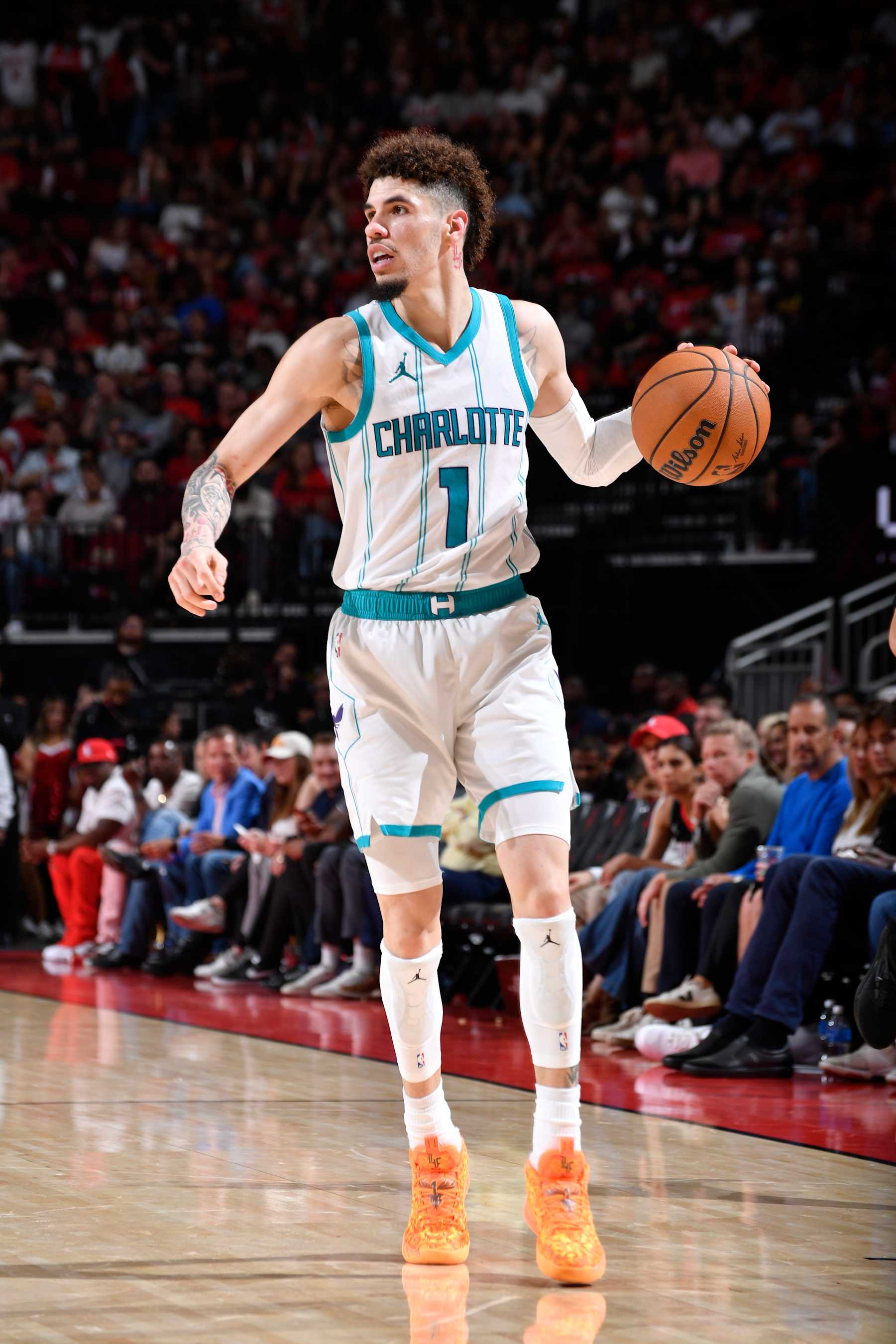 HOUSTON, TX - OCTOBER 23: LaMelo Ball #1 of the Charlotte Hornets dribbles the ball during the game against the Houston Rockets  during a regular season game on October 23, 2024 at the Toyota Center in Houston, Texas. NOTE TO USER: User expressly acknowledges and agrees that, by downloading and or using this photograph, User is consenting to the terms and conditions of the Getty Images License Agreement. Mandatory Copyright Notice: Copyright 2024 NBAE (Photo by Logan Riely/NBAE via Getty Images)