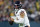 GREEN BAY, WISCONSIN - JANUARY 07: Justin Fields #1 of the Chicago Bears looks to pass against the Green Bay Packers at Lambeau Field on January 07, 2024 in Green Bay, Wisconsin. (Photo by John Fisher/Getty Images)