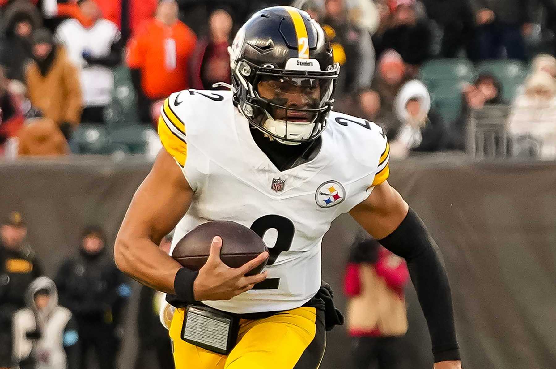 CINCINNATI, OHIO - DECEMBER 1: Quarterback Justin Fields #2 of the Pittsburgh Steelers scrambles out of the pocket during the second half of an NFL football game against the Cincinnati Bengals, at Paycor Stadium on December 1, 2024 in Cincinnati, Ohio. (Photo by Todd Rosenberg/Getty Images)