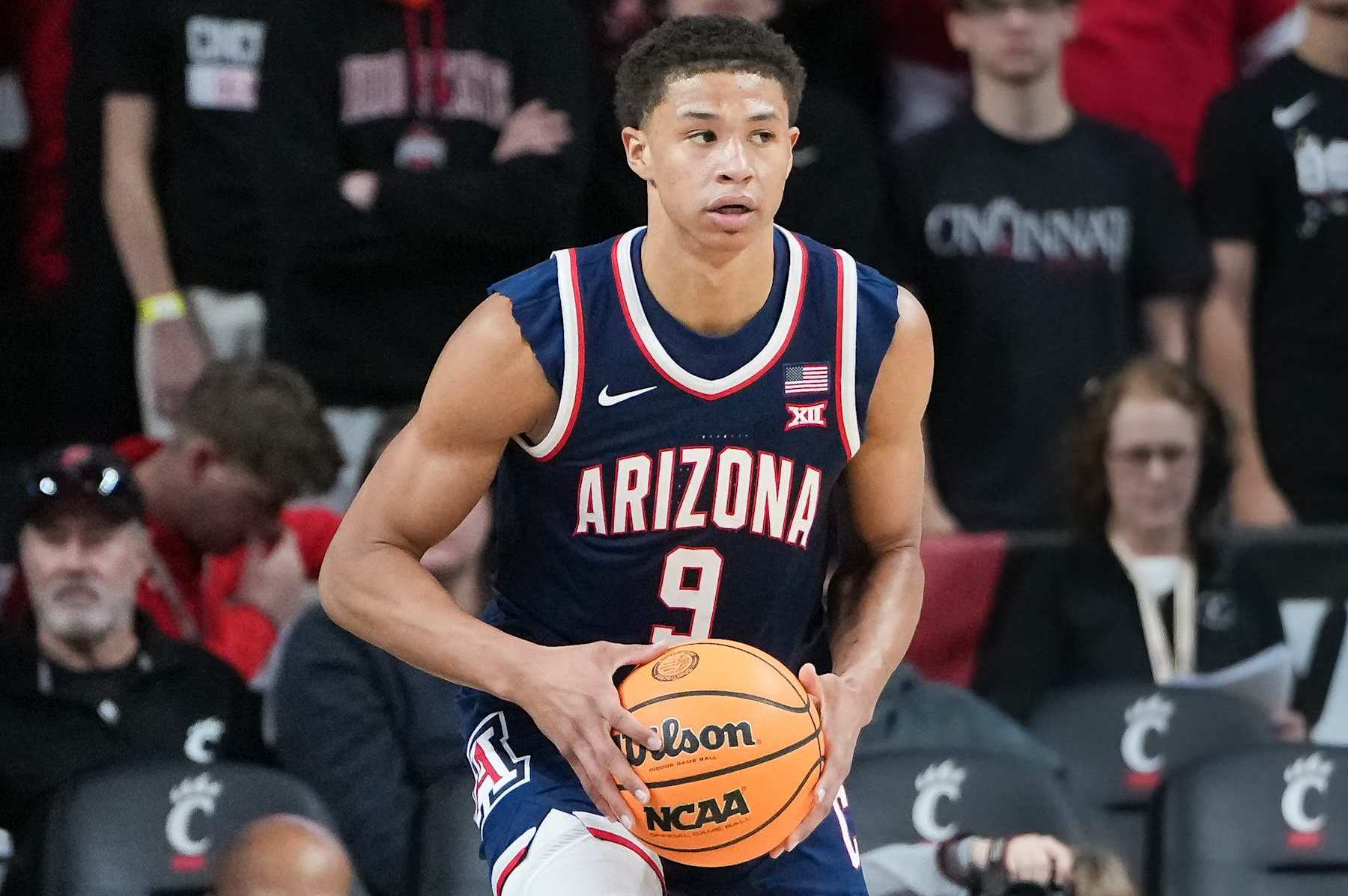 CINCINNATI, OHIO - JANUARY 04: Carter Bryant #9 of the Arizona Wildcats handles the ball in the first half against the Cincinnati Bearcats at Fifth Third Arena on January 04, 2025 in Cincinnati, Ohio. (Photo by Dylan Buell/Getty Images)