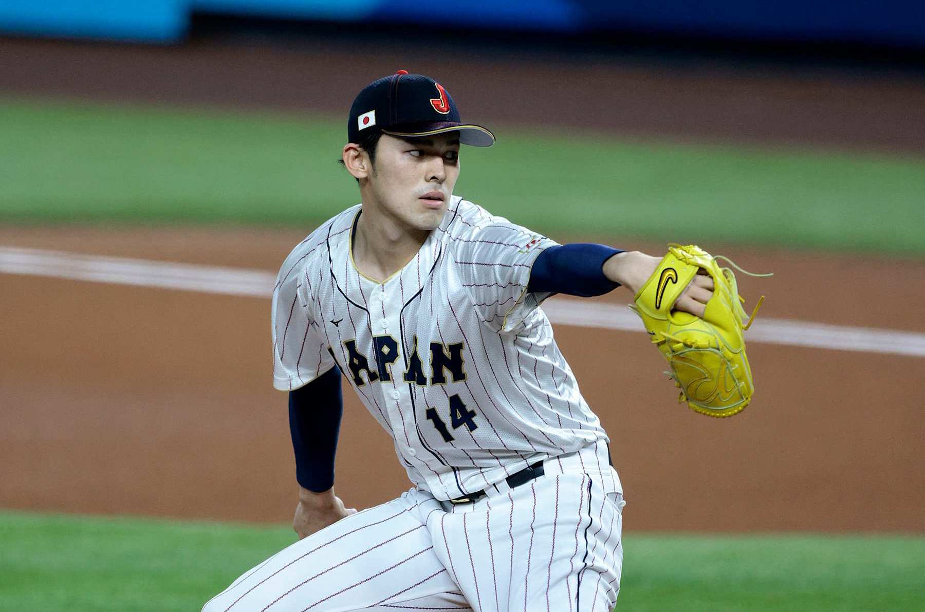 MIAMI, FL - MARCH 20: Roki Sasaki #14 of Team Japan pitches during the 2023 World Baseball Classic Semifinal game against Team Mexico at loanDepot Park on March 20, 2023 in Miami, Florida. (Photo by Christopher Pasatieri/Getty Images)