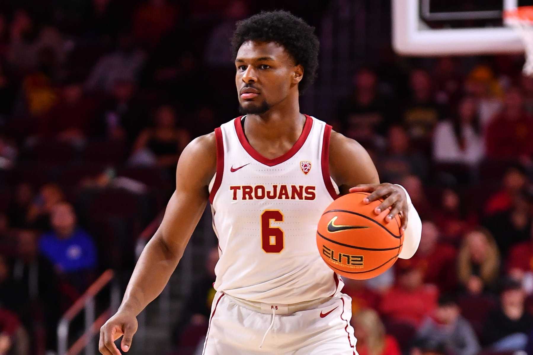 LOS ANGELES, CA - FEBRUARY 17: USC Trojans guard Bronny James (6) dribbles up the court during the college basketball game between the Colorado Buffaloes and the USC Trojans on February 17, 2024 at Galen Center in Los Angeles, CA. (Photo by Brian Rothmuller/Icon Sportswire via Getty Images)