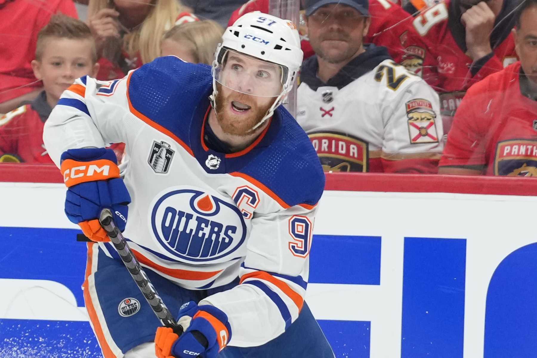 SUNRISE, FL - JUNE 10: Edmonton Oilers center Connor McDavid (97) looks to make a pass after being cut off in the third period during game two of the Stanley Cup Finals between the Edmonton Oilers and the Florida Panthers on Saturday, June 10, 2024 at Amerant Bank Area in Sunrise, Fla. (Photo by Peter Joneleit/Icon Sportswire via Getty Images)