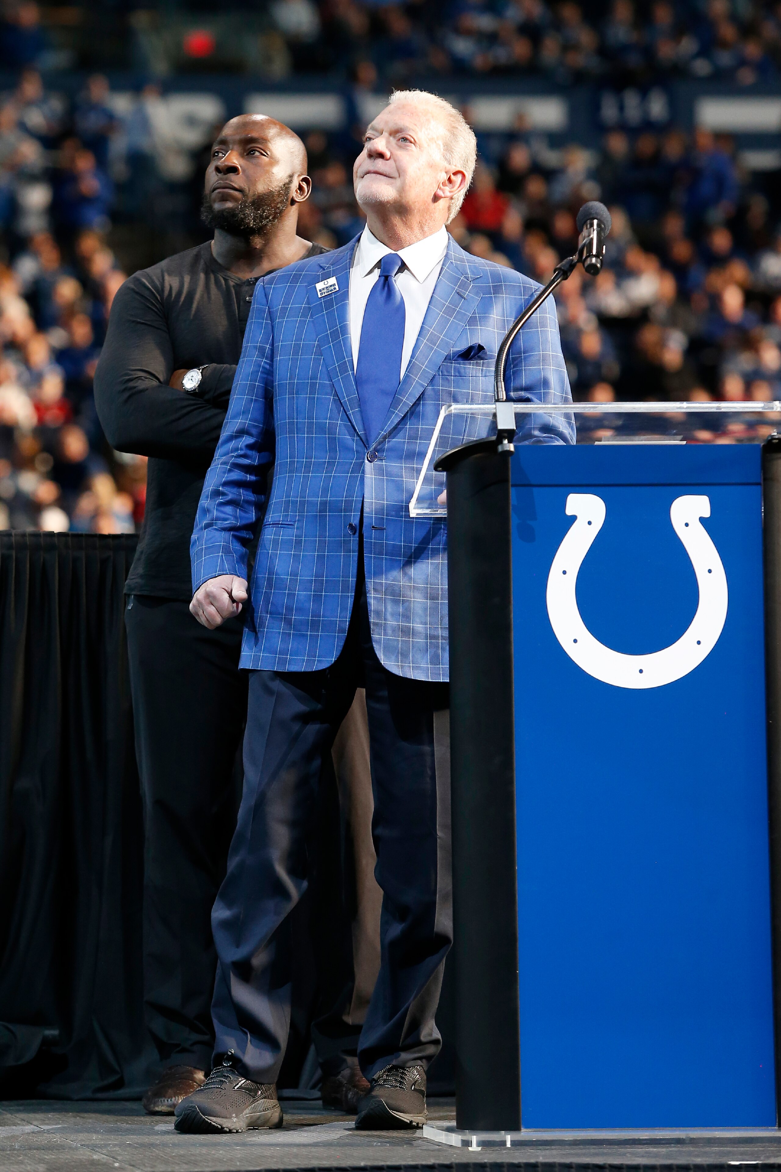 INDIANAPOLIS, IN - NOVEMBER 28: Indianapolis Colts Owner Jim Irsay watches the big screen as former Indianapolis Colt Robert Mathis is inducted into the ring of honor during a NFL game between the Tampa Bay Buccaneers and the Indianapolis Colts on November 28, 2021, at Lucas Oil Stadium in Indianapolis, IN. (Photo by Jeffrey Brown/Icon Sportswire via Getty Images)