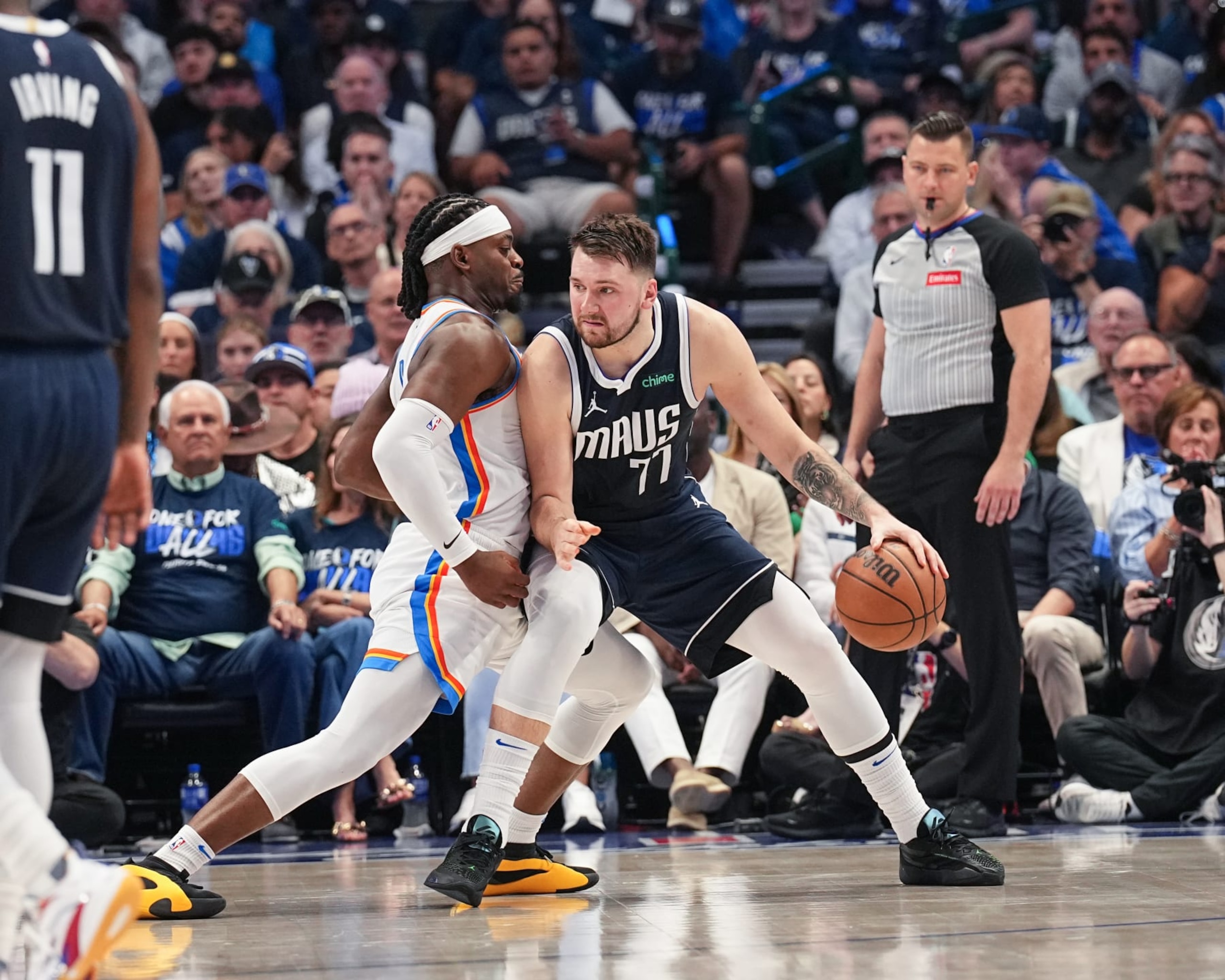 DALLAS, TX - MAY 11: Luguentz Dort #5 of the Oklahoma City Thunder plays defense during the game  against Luka Doncic #77 of the Dallas Mavericks during Round 2 Game 3 of the 2024 NBA Playoffs  on May 11, 2024  at the American Airlines Center in Dallas, Texas. NOTE TO USER: User expressly acknowledges and agrees that, by downloading and or using this photograph, User is consenting to the terms and conditions of the Getty Images License Agreement. Mandatory Copyright Notice: Copyright 2024 NBAE (Photo by Glenn James/NBAE via Getty Images)