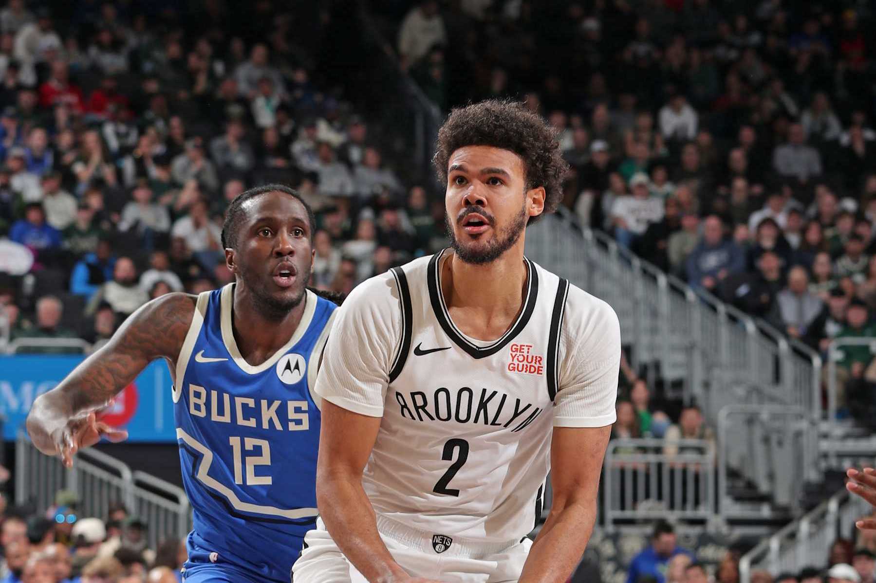MILWAUKEE, WI - DECEMBER 26: Cameron Johnson #2 of the Brooklyn Nets handles the ball during the game against the Milwaukee Bucks on December 26, 2024 at Fiserv Forum Center in Milwaukee, Wisconsin. NOTE TO USER: User expressly acknowledges and agrees that, by downloading and or using this Photograph, user is consenting to the terms and conditions of the Getty Images License Agreement. Mandatory Copyright Notice: Copyright 2024 NBAE (Photo by Gary Dineen/NBAE via Getty Images).