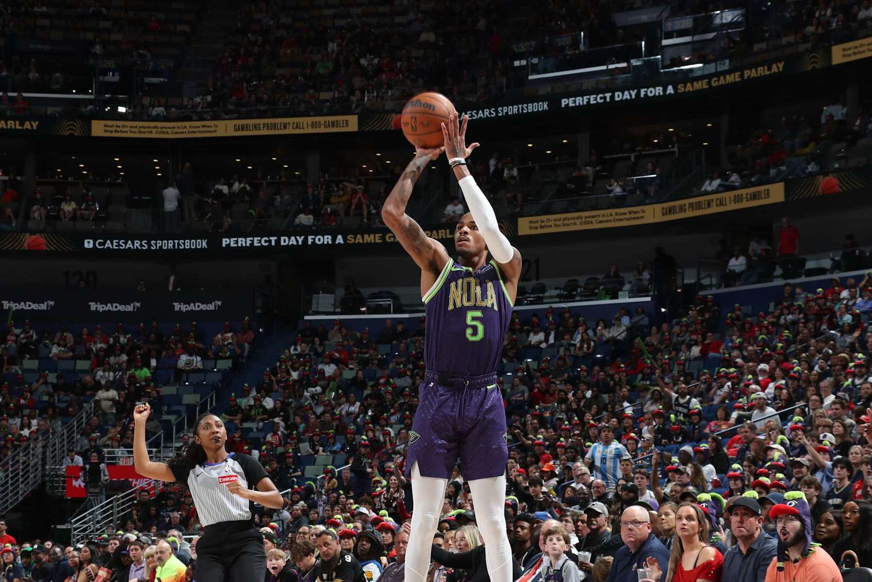 NEW ORLEANS, LA - NOVEMBER 27: Dejounte Murray #5 of the New Orleans Pelicans shoots the ball during the game against the Toronto Raptors during a regular season game on November 27, 2024 at the Smoothie King Center in New Orleans, Louisiana. NOTE TO USER: User expressly acknowledges and agrees that, by downloading and or using this Photograph, user is consenting to the terms and conditions of the Getty Images License Agreement. Mandatory Copyright Notice: Copyright 2024 NBAE (Photo by Layne Murdoch Jr./NBAE via Getty Images)