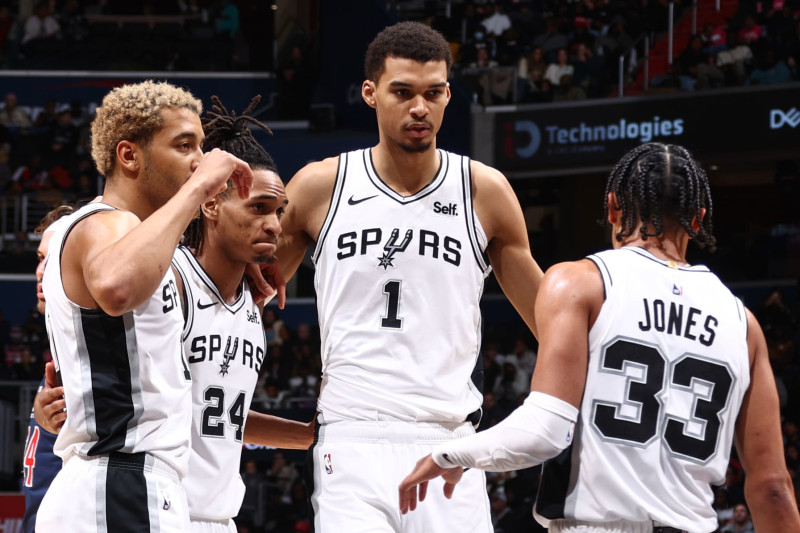 WASHINGTON, DC -  JANUARY 20: San Antonio Spurs huddle up during the game against the Washington Wizards on January 20, 2024 at Capital One Arena in Washington, DC. NOTE TO USER: User expressly acknowledges and agrees that, by downloading and or using this Photograph, user is consenting to the terms and conditions of the Getty Images License Agreement. Mandatory Copyright Notice: Copyright 2024 NBAE (Photo by Kenny Giarla/NBAE via Getty Images)