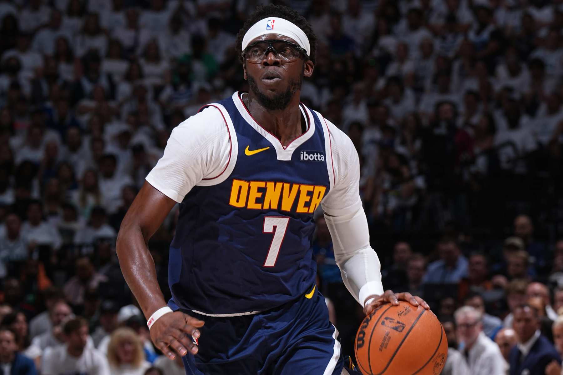 MINNEAPOLIS, MN - MAY 12: Reggie Jackson #7 of the Denver Nuggets dribbles the ball during the game against the Minnesota Timberwolves during Round 2 Game 4 of the 2024 NBA Playoffs on May 12, 2024 at Target Center in Minneapolis, Minnesota. NOTE TO USER: User expressly acknowledges and agrees that, by downloading and/or using this Photograph, user is consenting to the terms and conditions of the Getty Images License Agreement. Mandatory Copyright Notice: Copyright 2024 NBAE (Photo by Garrett Ellwood/NBAE via Getty Images)