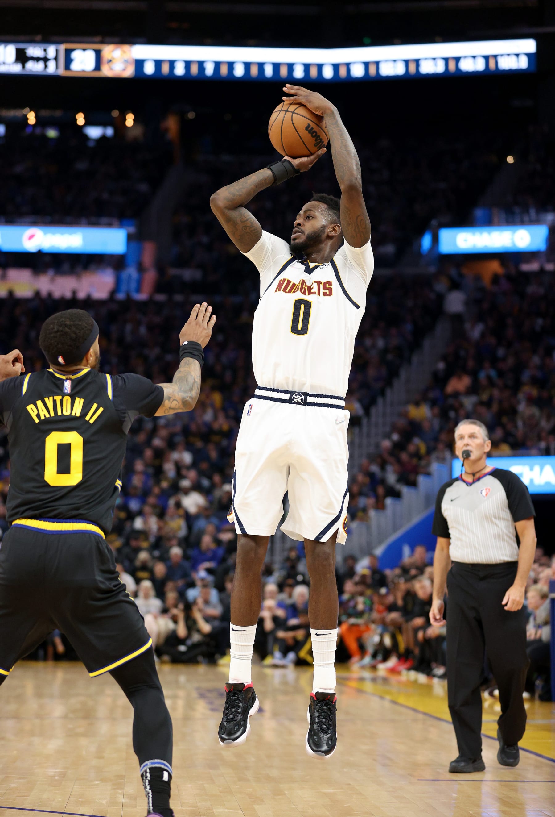 SAN FRANCISCO, CALIFORNIA - APRIL 16: JaMychal Green #0 of the Denver Nuggets in action against the Golden State Warriors during Game One of the Western Conference First Round NBA Playoffs at Chase Center on April 16, 2022 in San Francisco, California. NOTE TO USER: User expressly acknowledges and agrees that, by downloading and/or using this photograph, User is consenting to the terms and conditions of the Getty Images License Agreement. (Photo by Ezra Shaw/Getty Images)