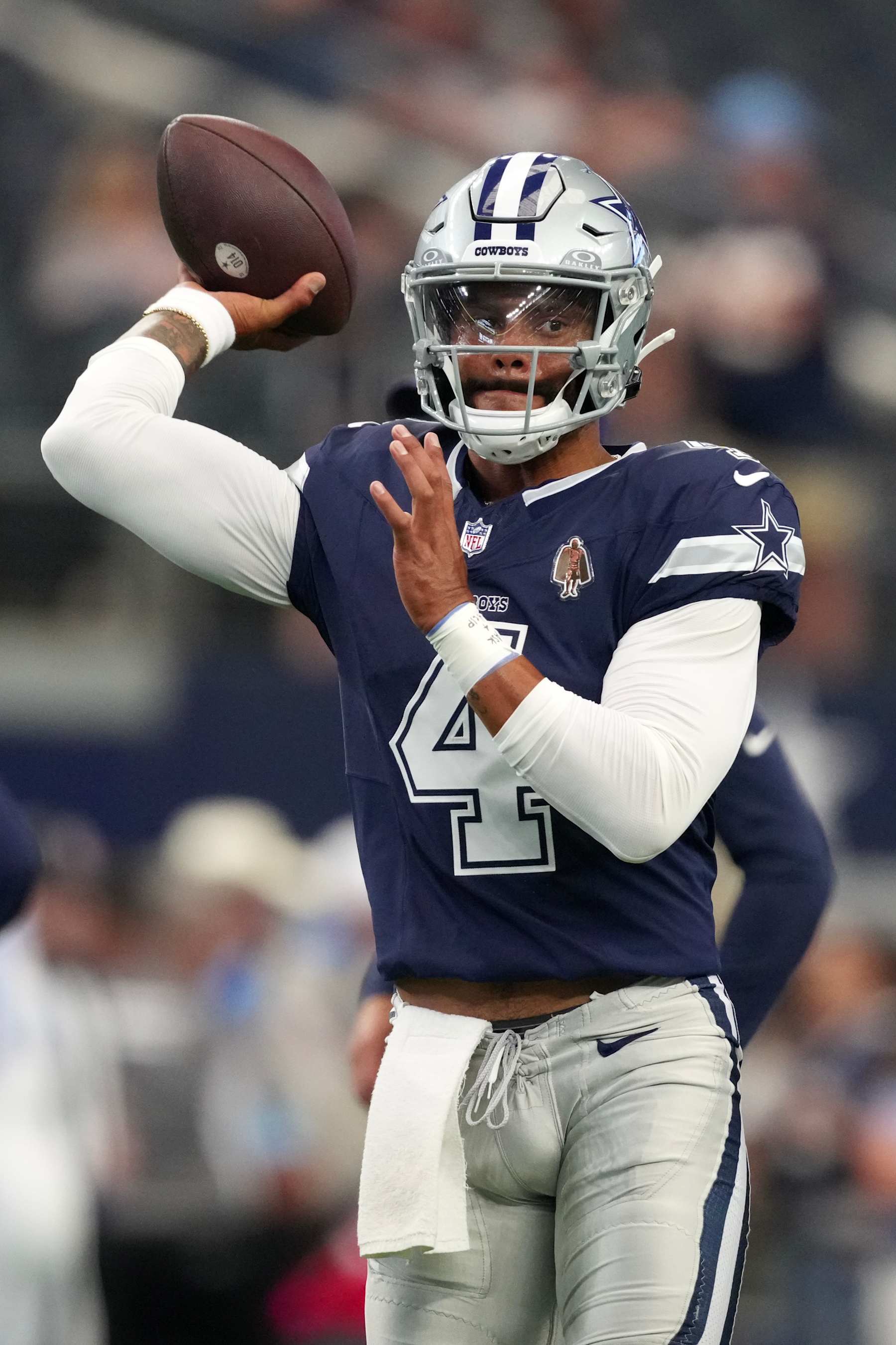 ARLINGTON, TEXAS - AUGUST 24: Dak Prescott #4 of the Dallas Cowboys warms up before a preseason game against the Los Angeles Chargers at AT&T Stadium on August 24, 2024 in Arlington, Texas. (Photo by Sam Hodde/Getty Images)