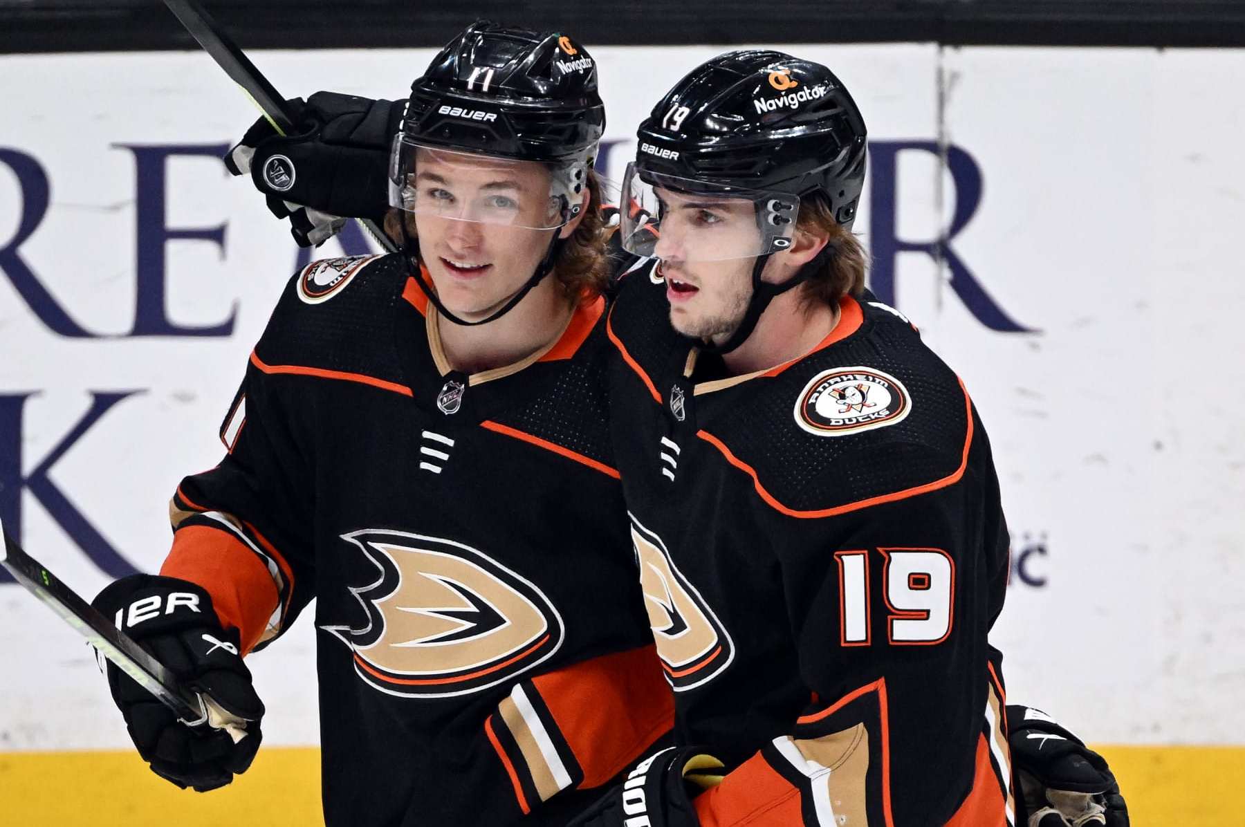 ANAHEIM, CA - APRIL 13: Anaheim Ducks center Trevor Zegras (11) on the ice with right wing Troy Terry (19) after Zebras scored a goal in the third period of an NHL hockey game against the Los Angeles Kings played on April 13, 2023 at the Honda Center in Anaheim, CA. (Photo by John Cordes/Icon Sportswire via Getty Images)