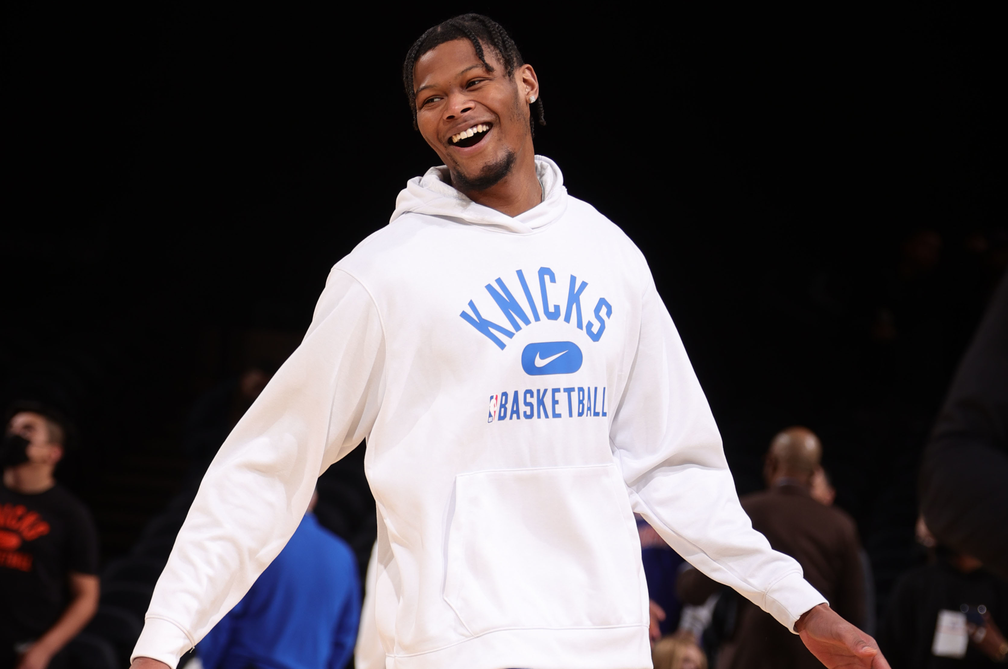 NEW YORK, NY - JANUARY 18: Cam Reddish #21 of the New York Knicks smiles before the game against the Minnesota Timberwolves on January 18, 2022 at Madison Square Garden in New York City, New York.  NOTE TO USER: User expressly acknowledges and agrees that, by downloading and or using this photograph, User is consenting to the terms and conditions of the Getty Images License Agreement. Mandatory Copyright Notice: Copyright 2022 NBAE  (Photo by Nathaniel S. Butler/NBAE via Getty Images)