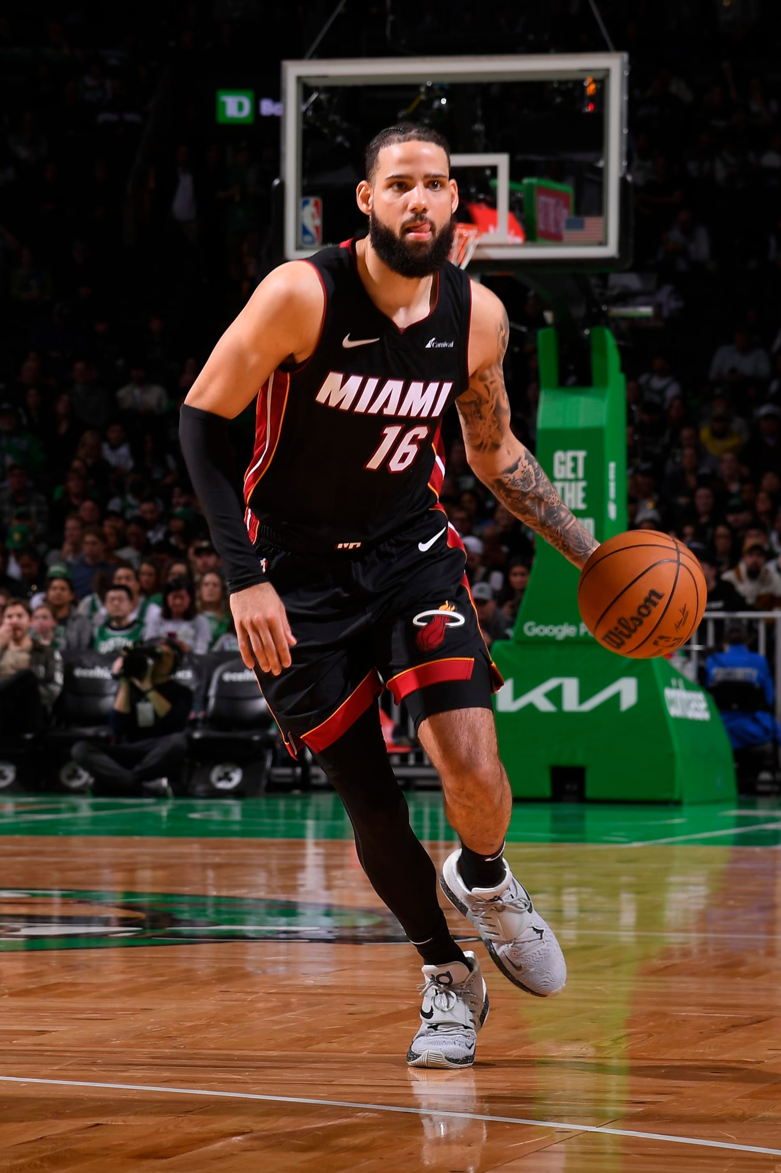 BOSTON, MA - APRIL 24: Caleb Martin #16 of the Miami Heat handles the ball during the game against the Boston Celtics during Round 1 Game 2 of the 2024 NBA Playoffs on April 24, 2024 at the TD Garden in Boston, Massachusetts. NOTE TO USER: User expressly acknowledges and agrees that, by downloading and or using this photograph, User is consenting to the terms and conditions of the Getty Images License Agreement. Mandatory Copyright Notice: Copyright 2024 NBAE  (Photo by Brian Babineau/NBAE via Getty Images)